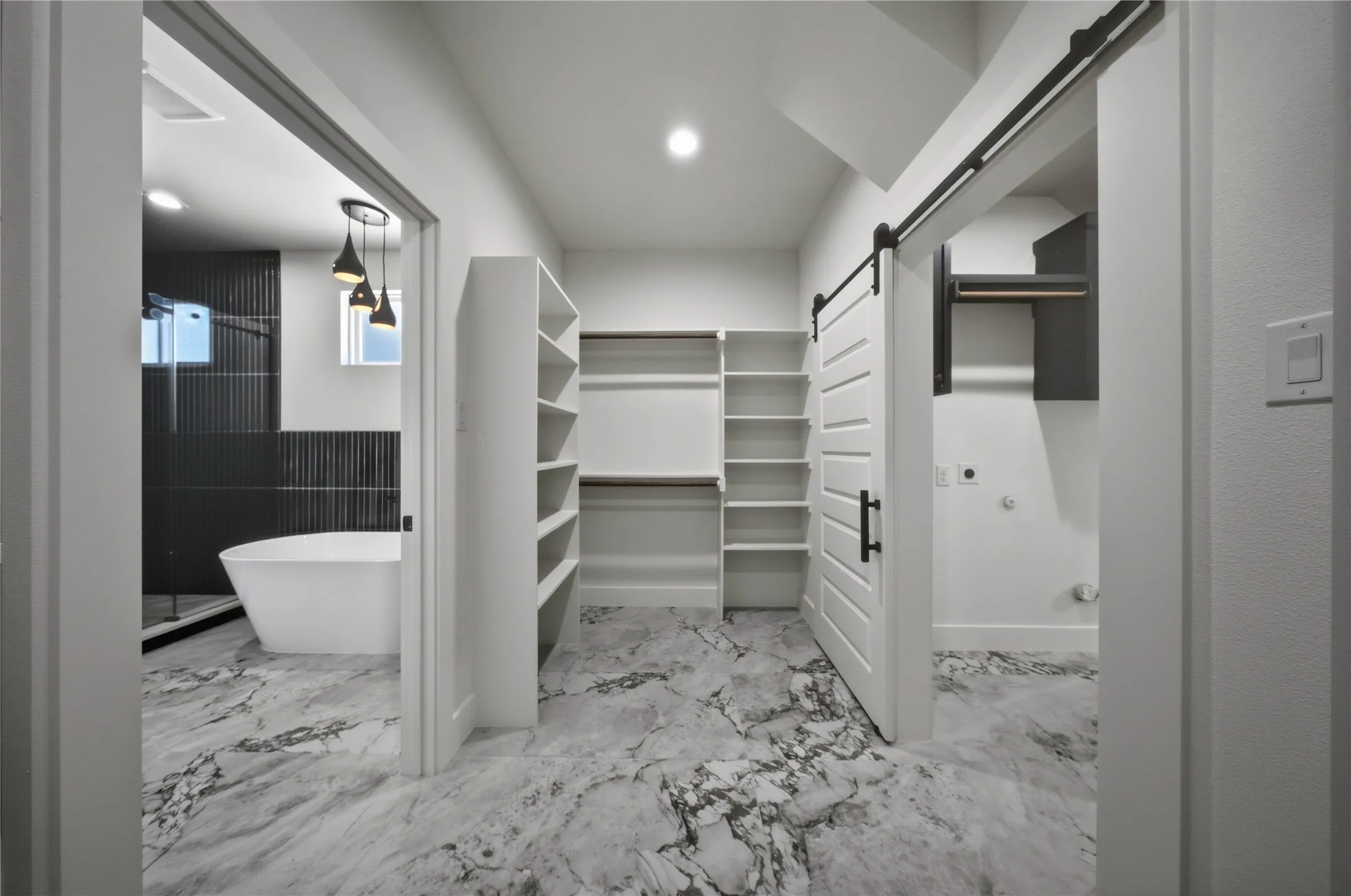 His & Her Closet access to laundry room