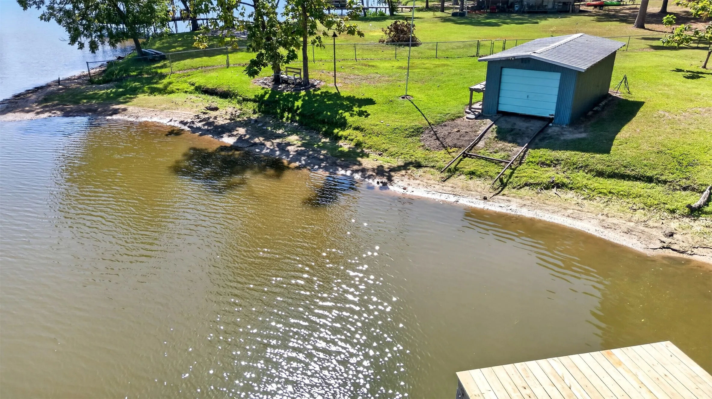 Waterfront beach with onland boat house