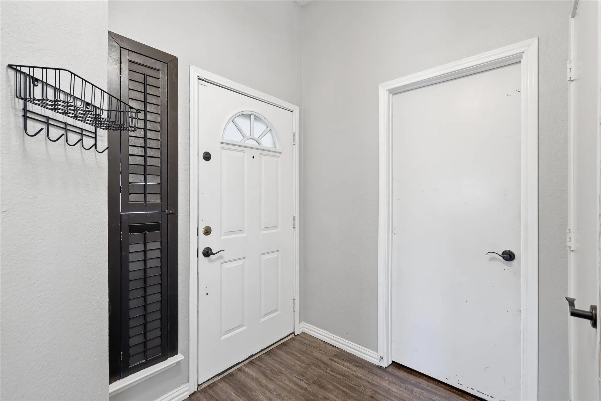 Spacious entryway with access to garage.