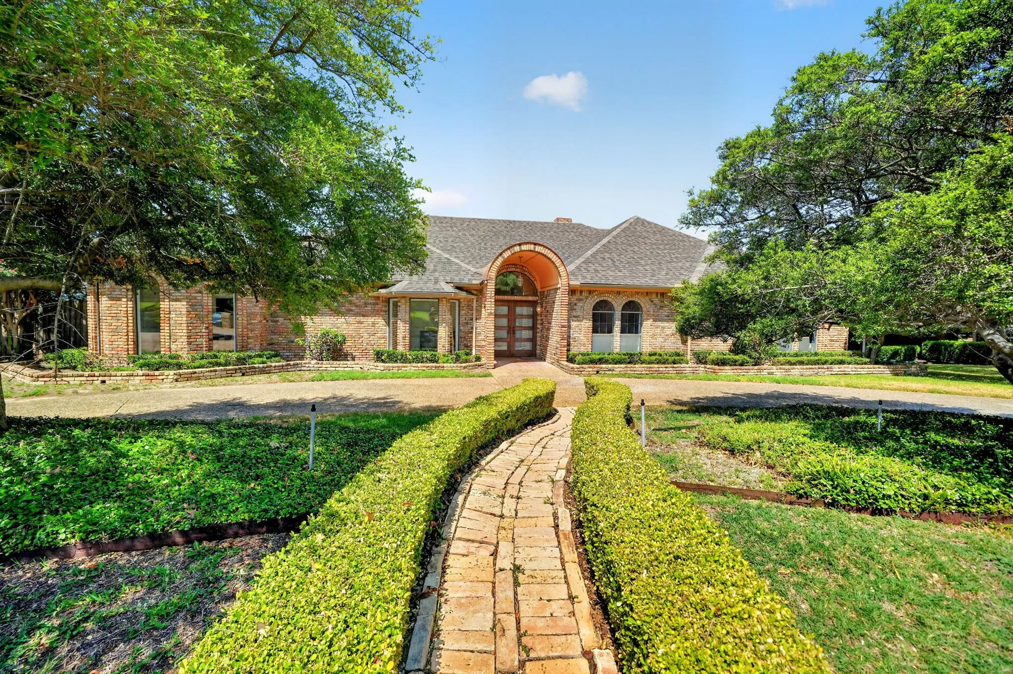 Brick exterior with arched entryway
