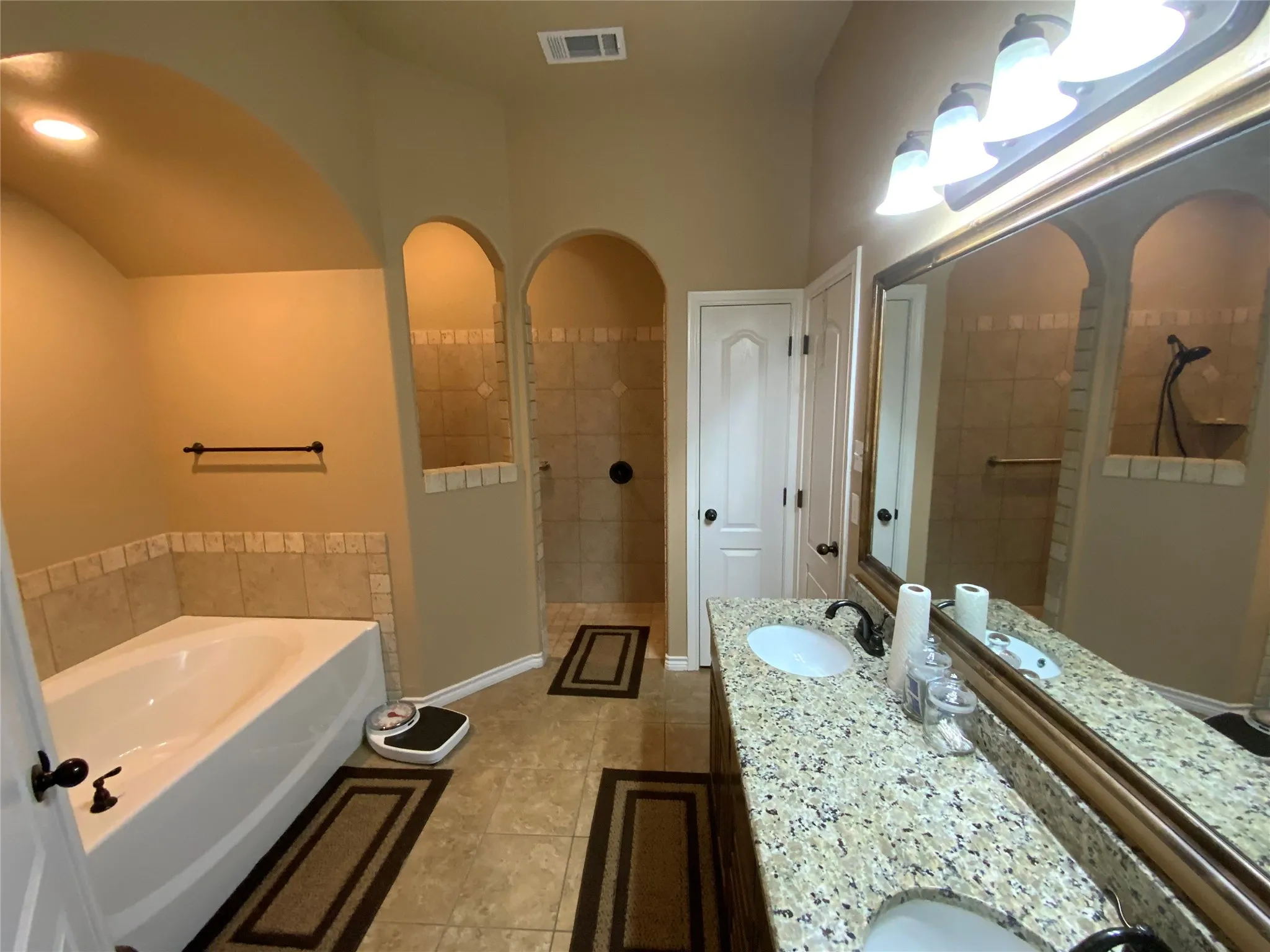 Dual vanity with granite-style countertop
