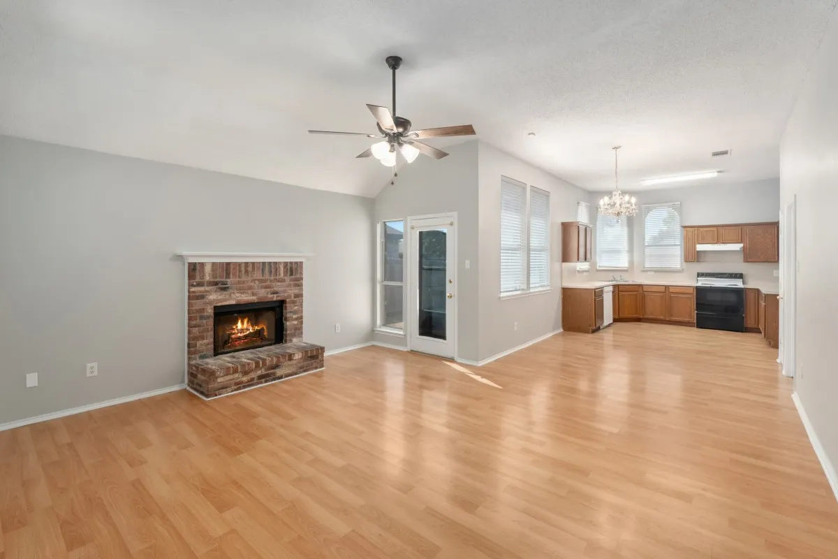 Laminate flooring throughout the living, dining and kitchen areas