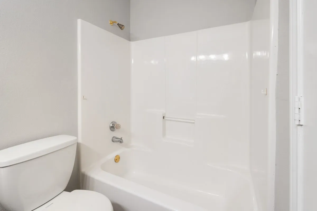 Primary bathroom shower and tub
