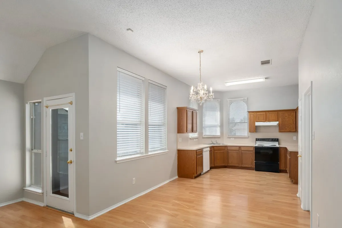 Dining and thoughtful kitchen arrangement