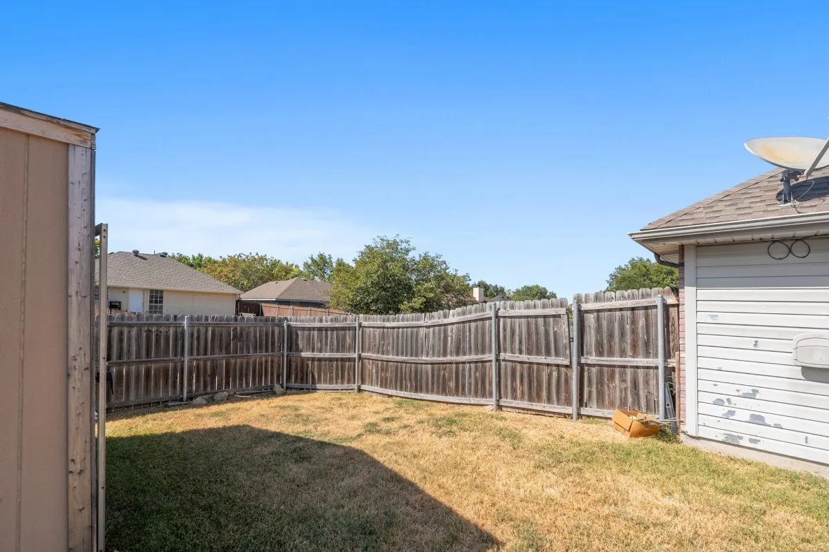 Backyard big enough for a play set or some beautiful landscape