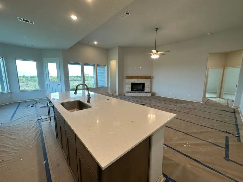 Kitchen island with undermount sink and gooseneck faucet