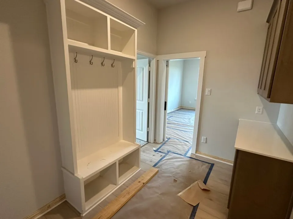 Built-in hall tree with storage cubbies and coat hooks