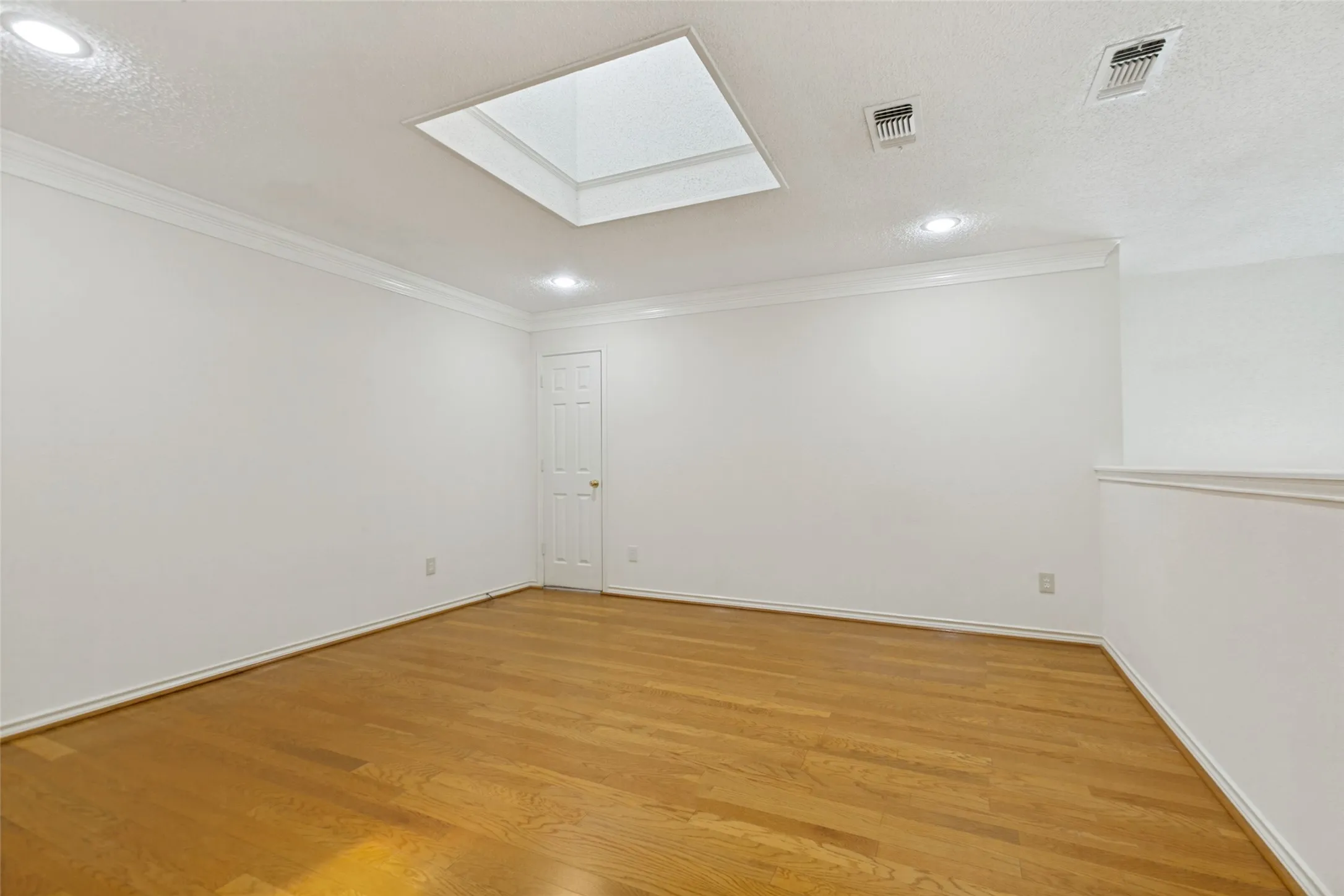 Door leads to a walk-in attic