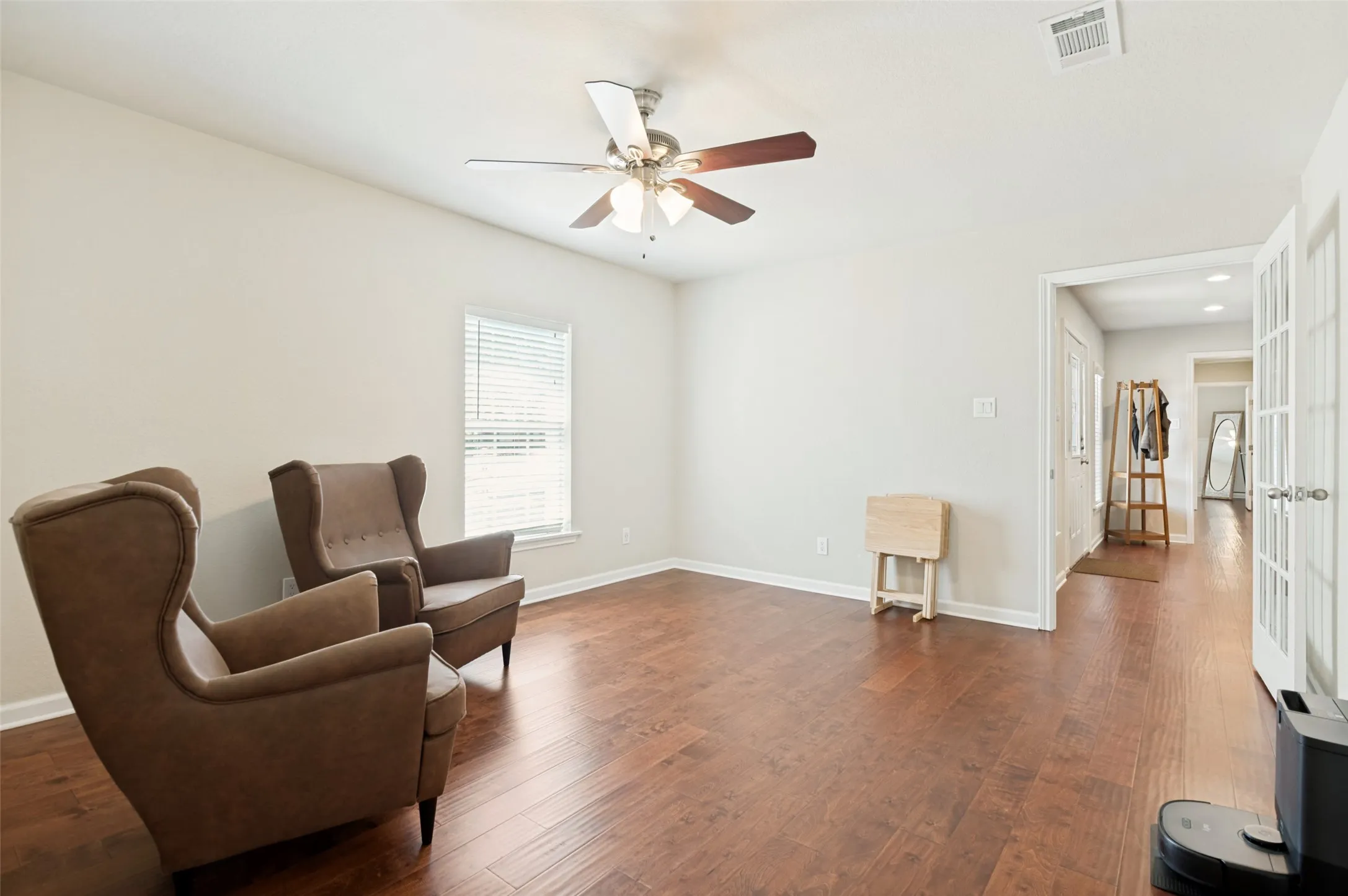Dining room has doors on each side and could be used as an office or additional living space