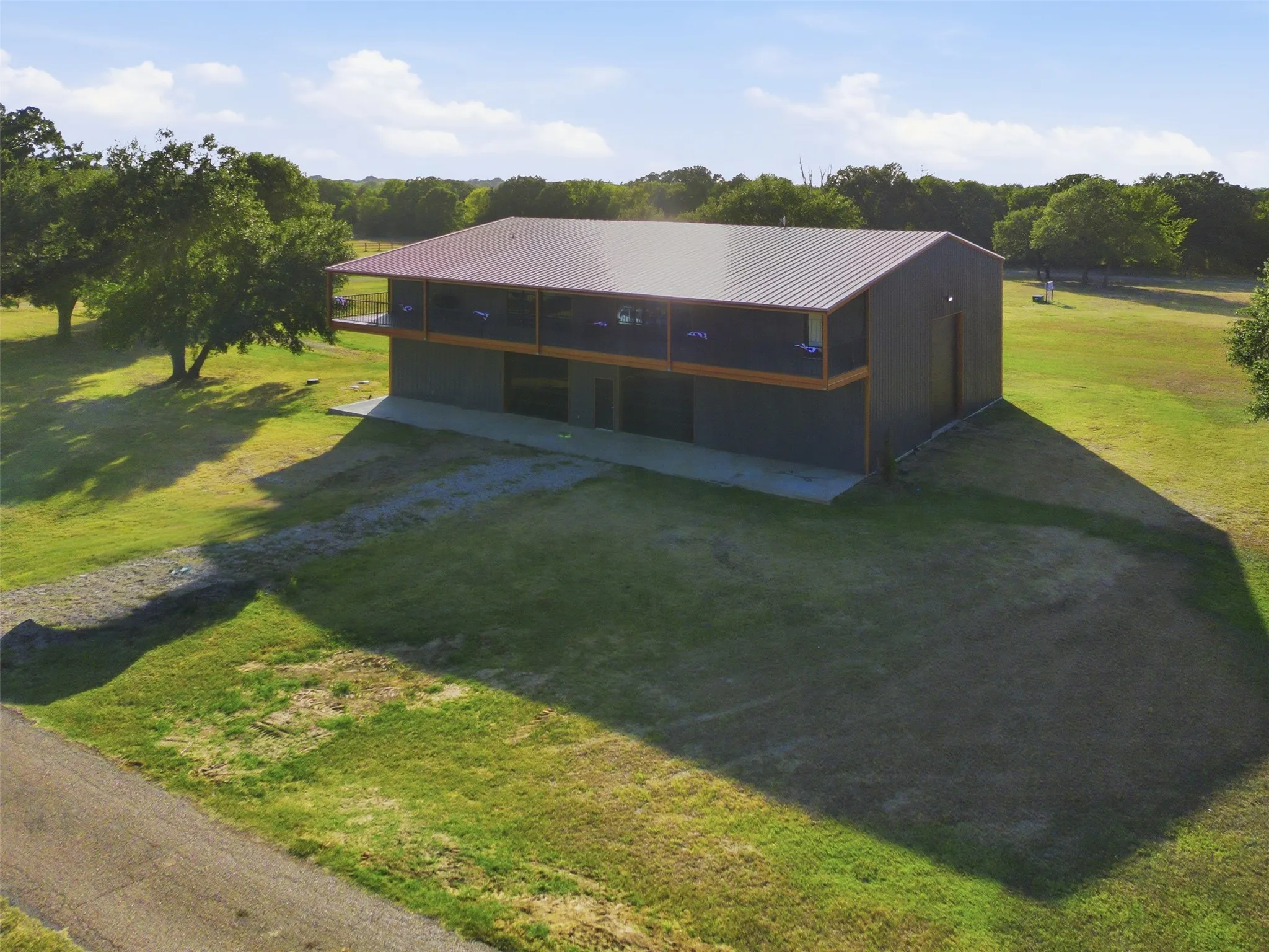 Exterior view of barndominium with additional living spaces