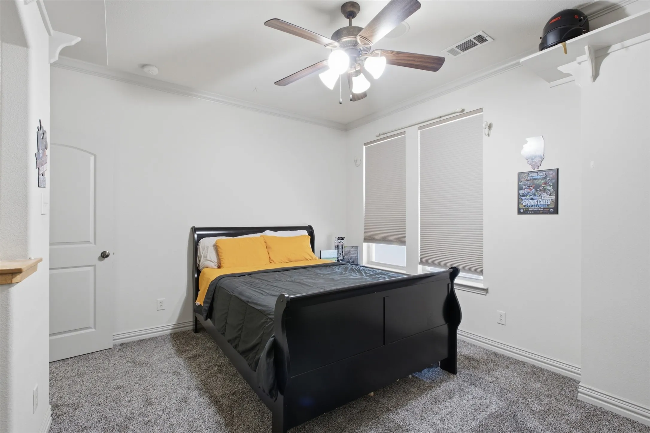 Neutral wall finishes, recessed lighting, and a ceiling fan with integrated lighting