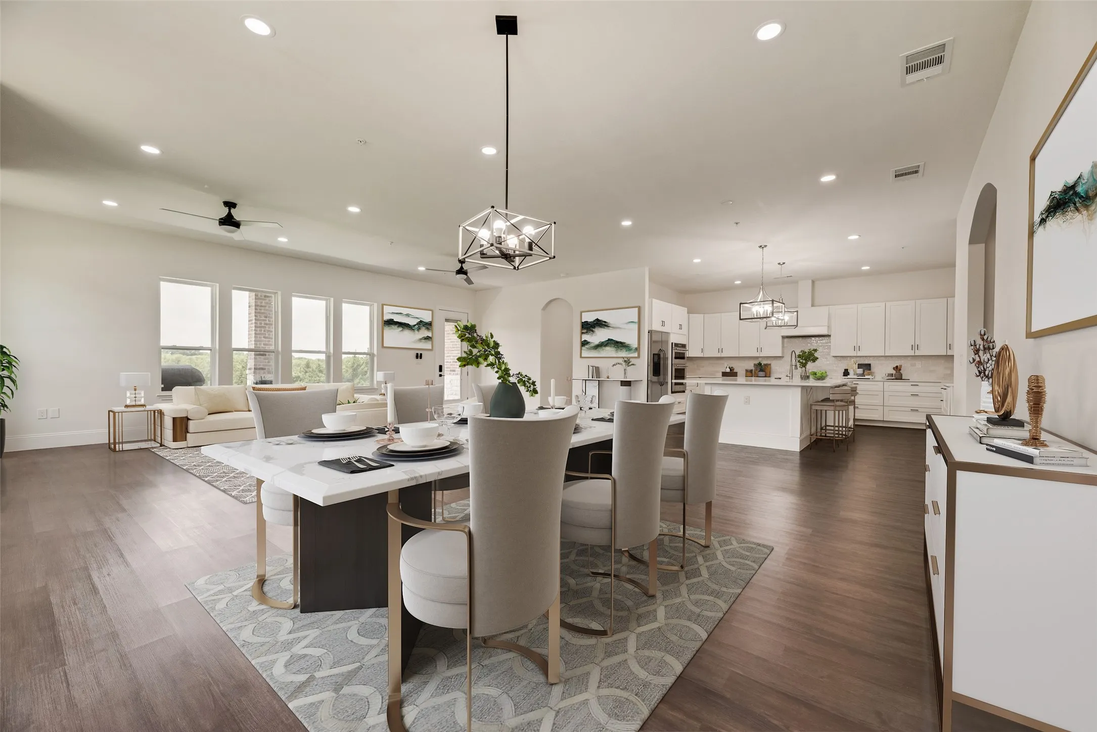 Wood-finish flooring throughout, recessed lighting, and a modern geometric pendant light fixture