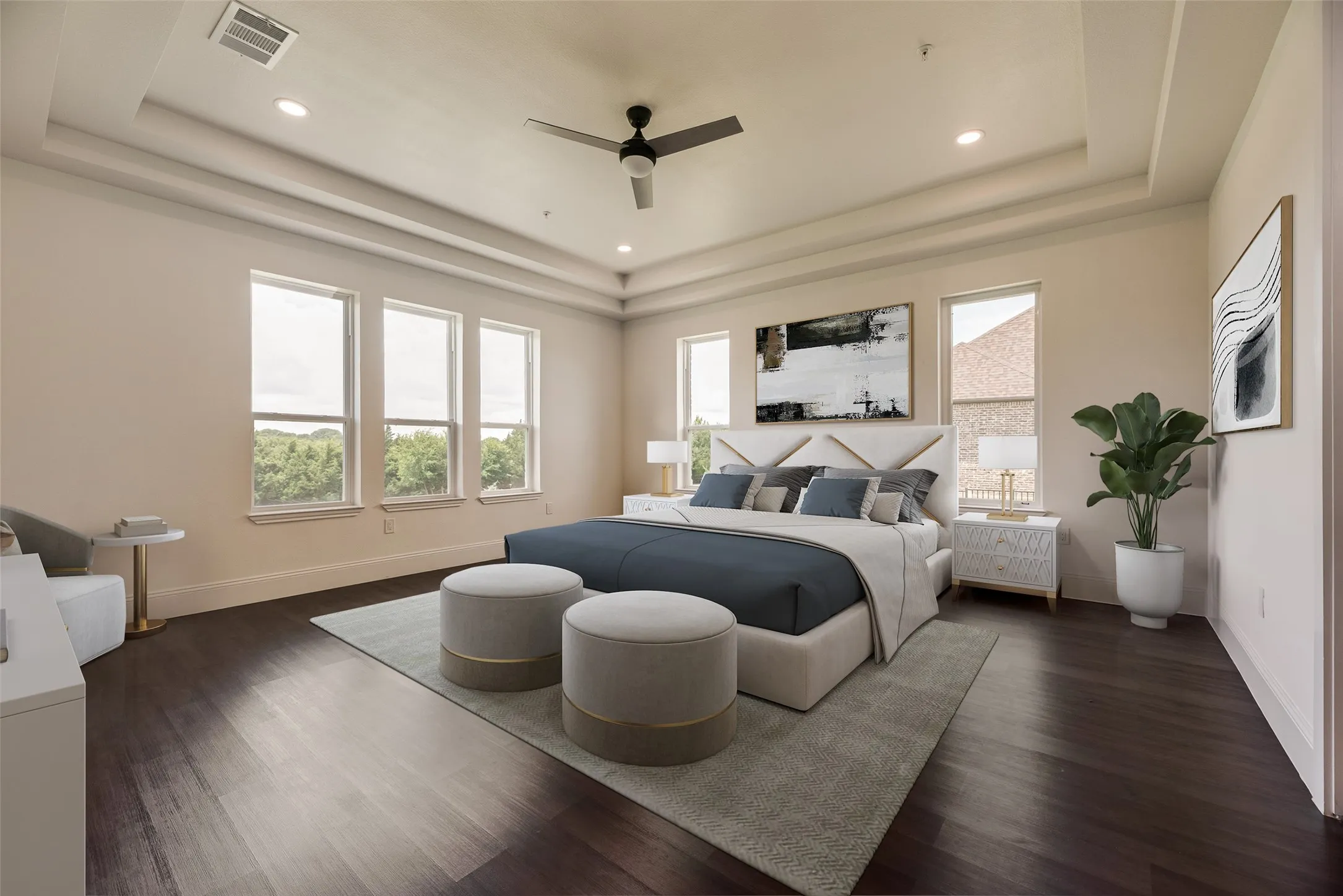 Tray ceiling with recessed lighting and a ceiling fan