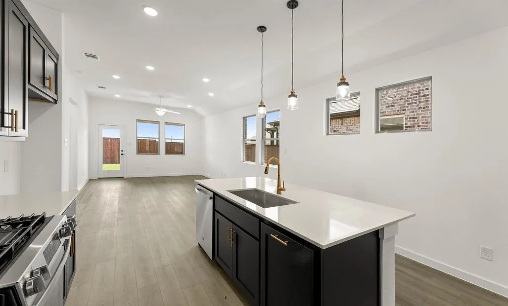 Open Kitchen-Living-Dining Room Representative Photo featuring the Noir Collection