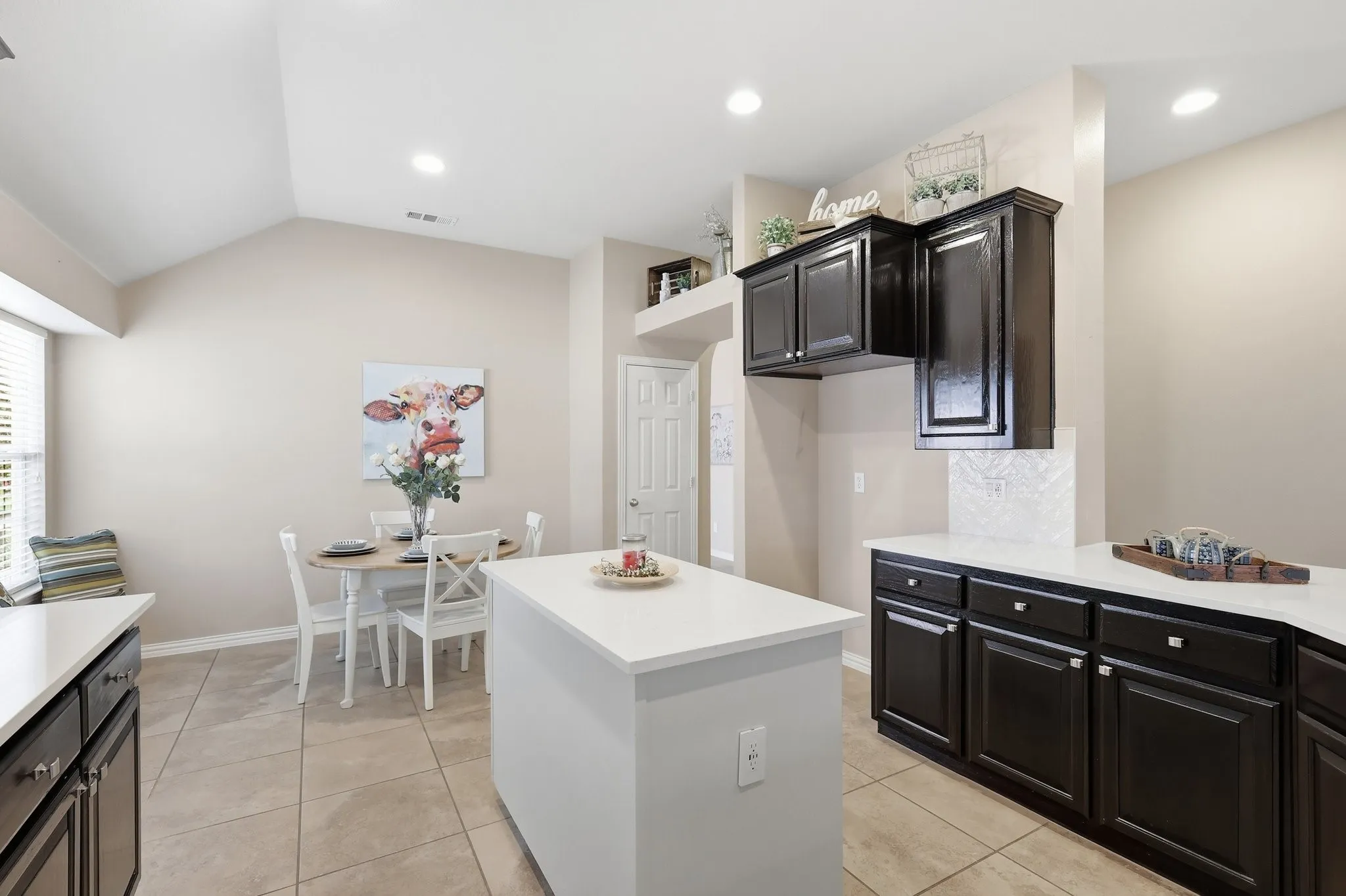 Vaulted ceiling with recessed lighting