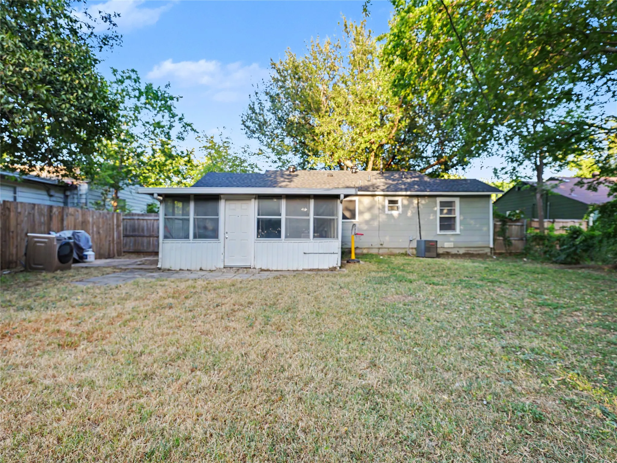 Expansive backyard space featuring a fenced perimeter