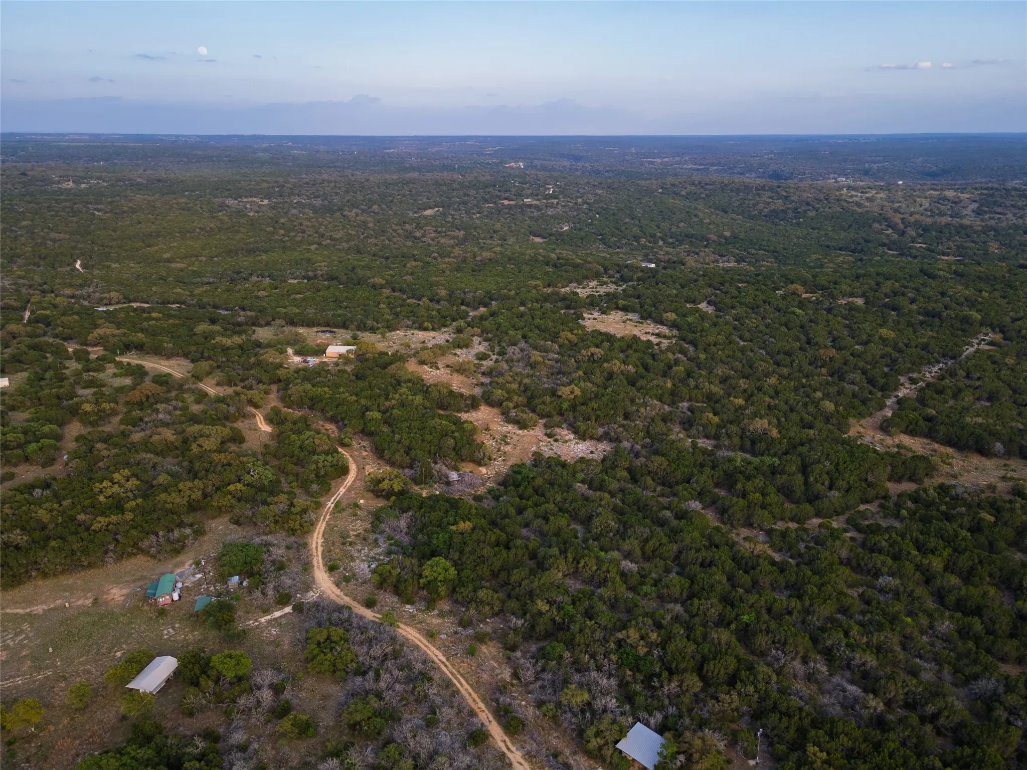 Expansive natural landscape with dense tree coverage
