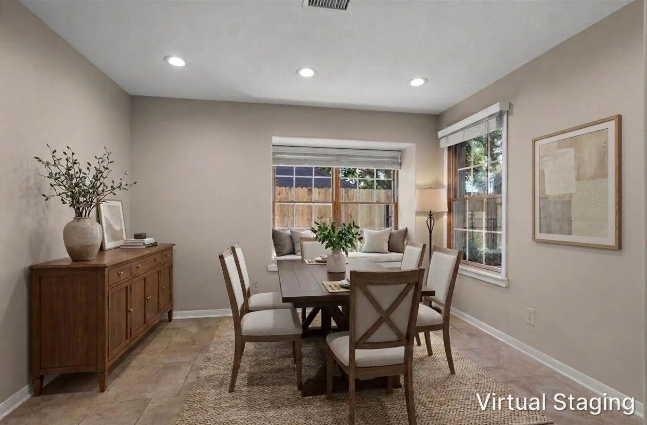 Bright flex room with tile flooring and natural light — ideal for a home office or dining area