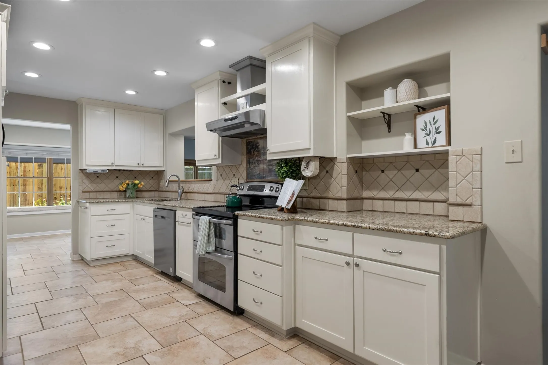 Additional kitchen view highlighting ample counter and storage space