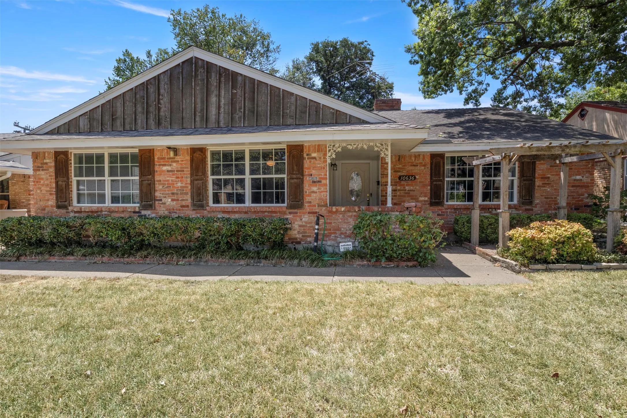 Brick exterior with wood siding accents