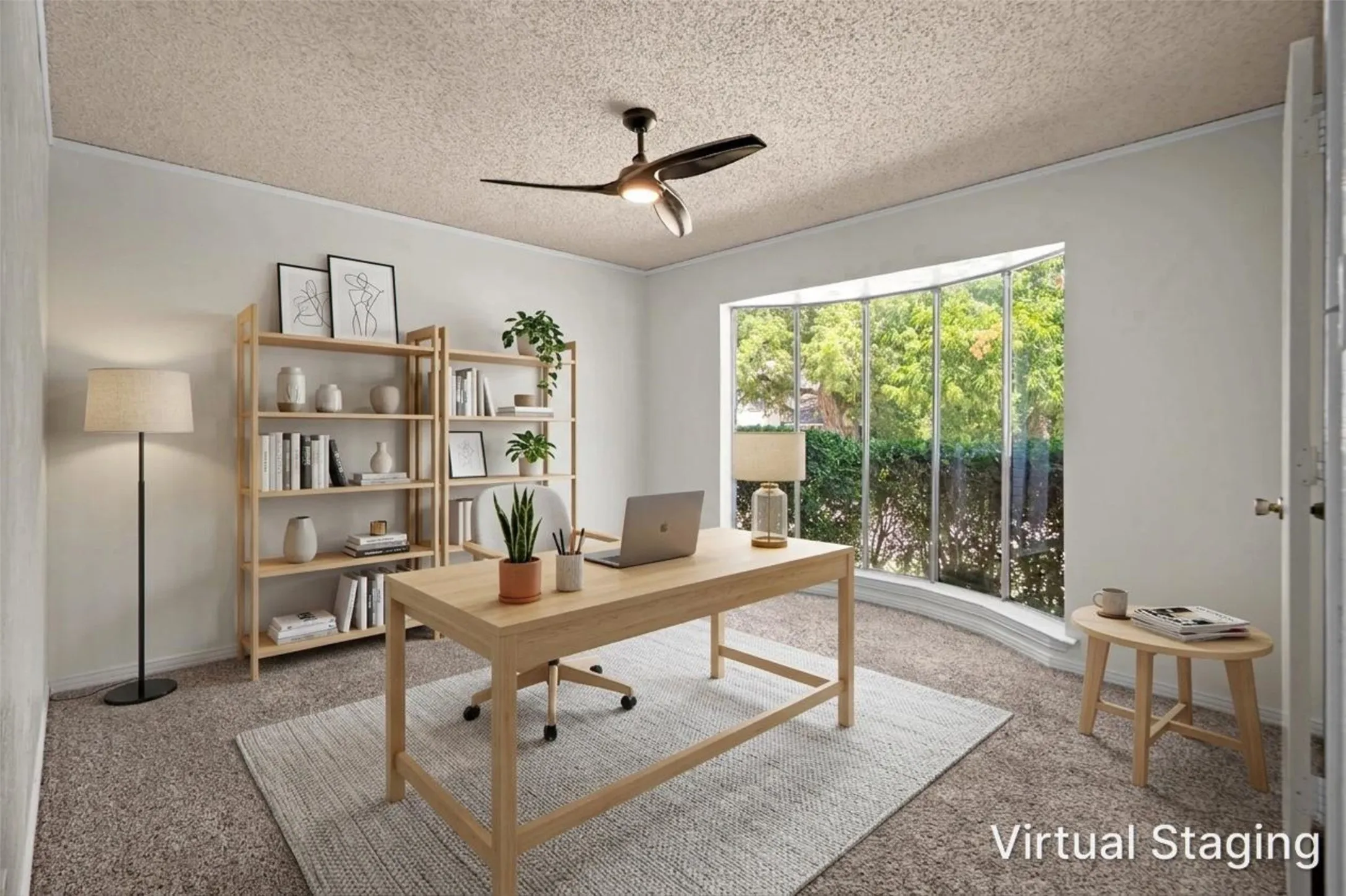 Curved bay window, textured ceiling, ceiling fan, and wall-to-wall carpeting