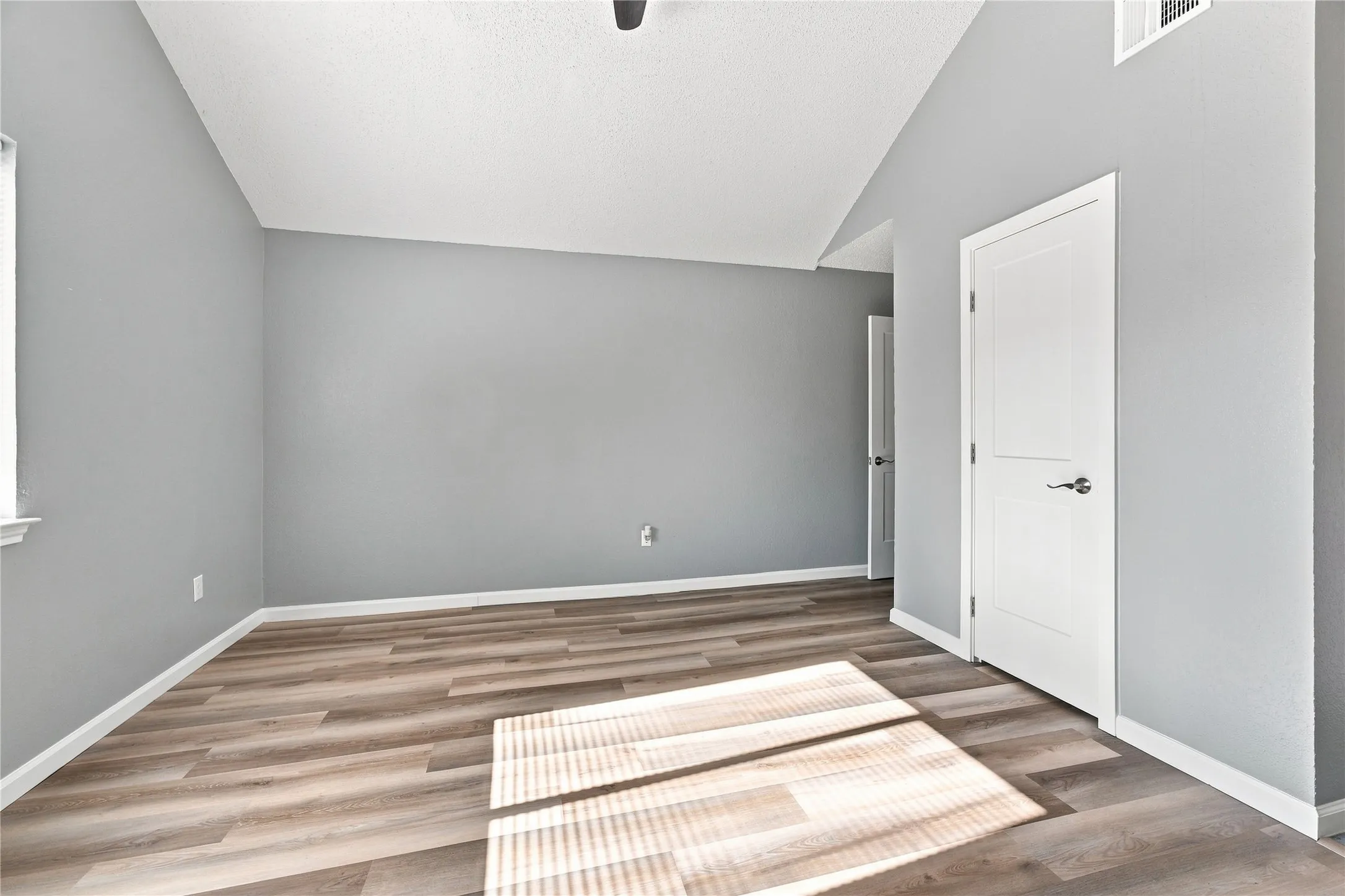 Bedroom with inviting feel and natural lighting.