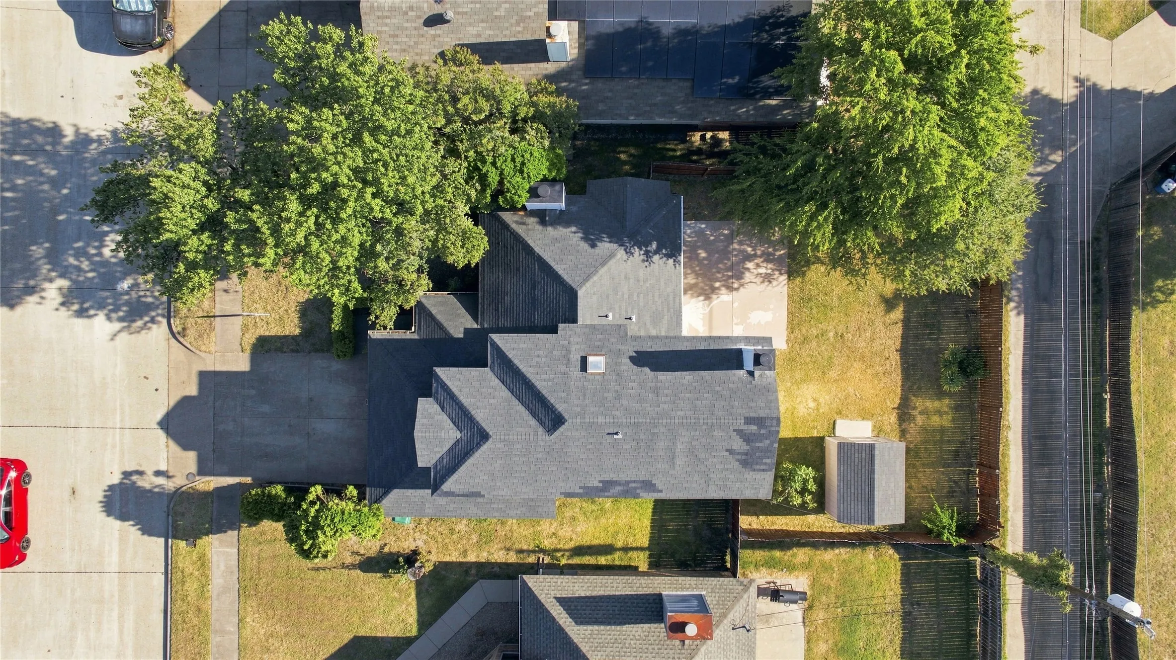 Aerial view of spacious lot and property layout.