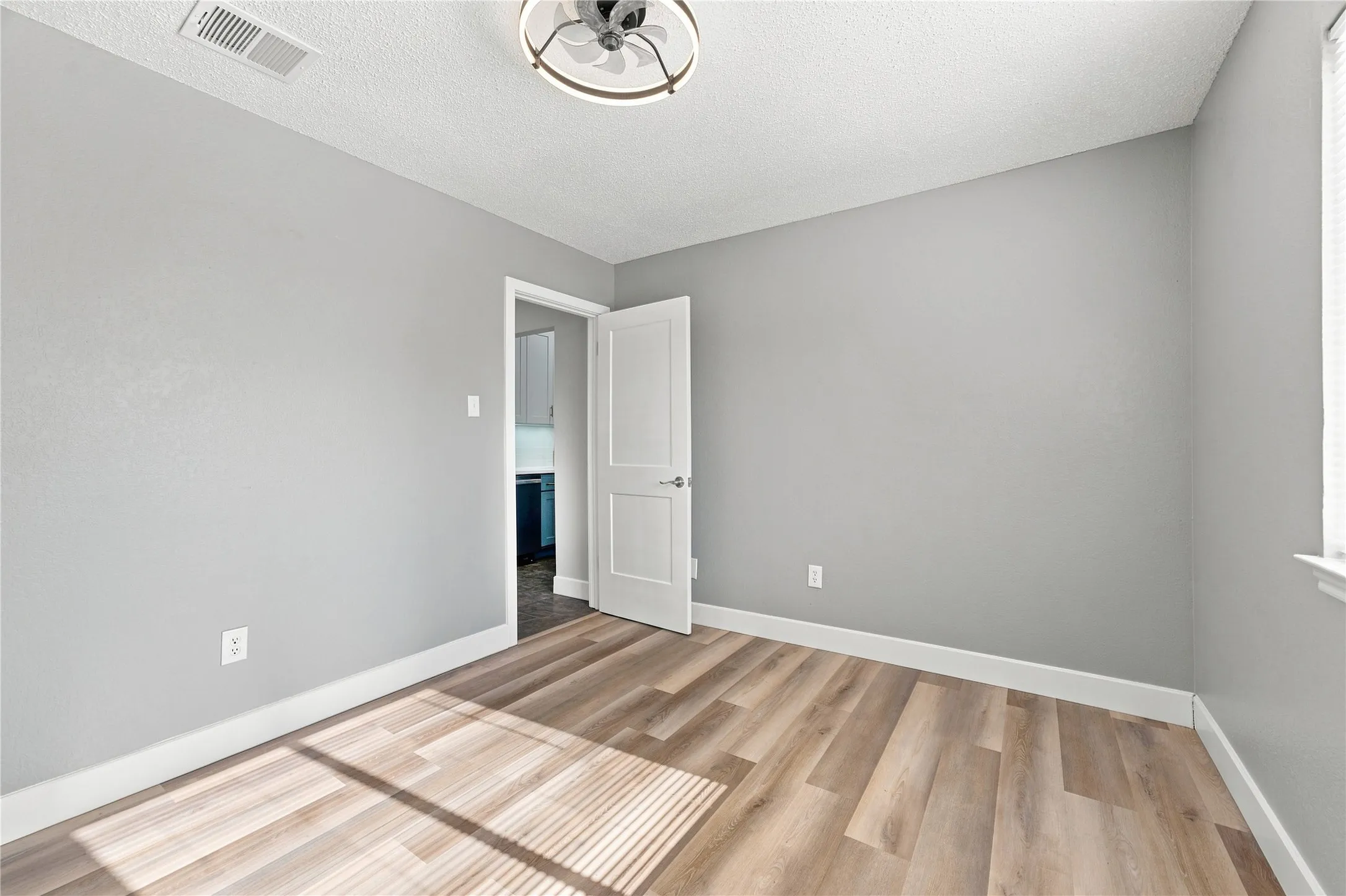 Bright and comfortable bedroom complete with dual closets for added storage and functionality.