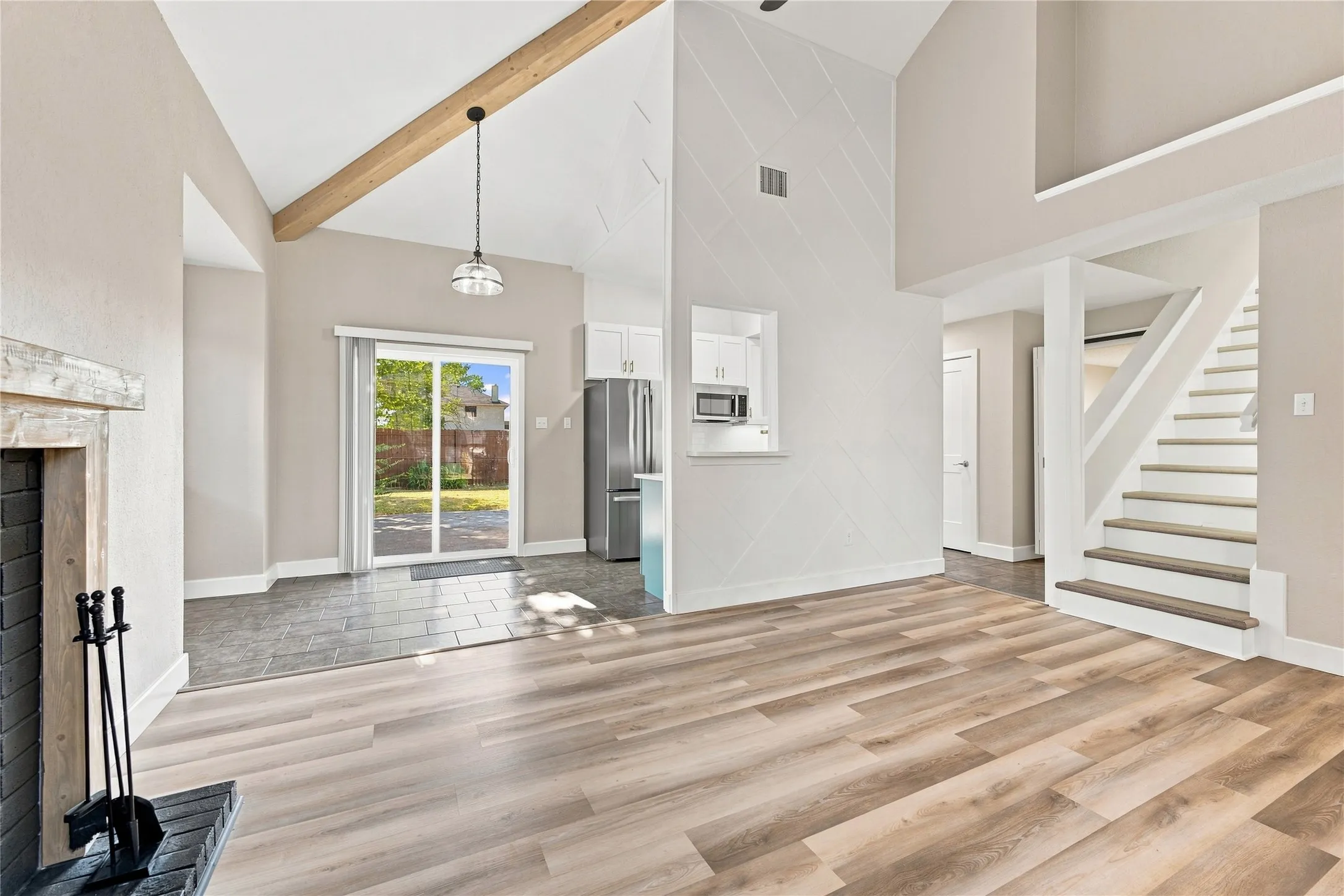 Open living and dining area offering a spacious, versatile layout ideal for everyday living and entertaining.