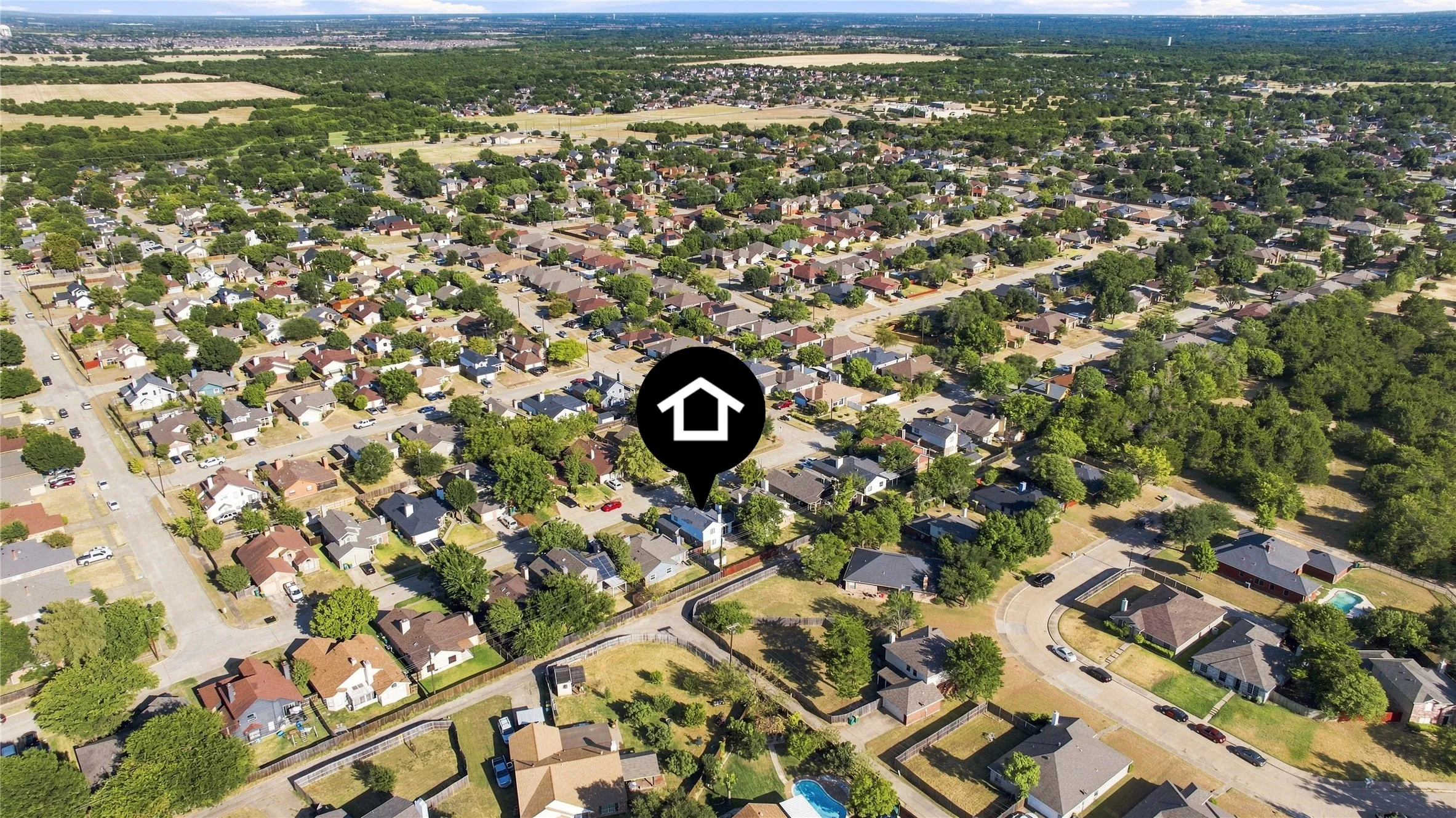 Aerial view showcasing the surrounding neighborhood and community setting.
