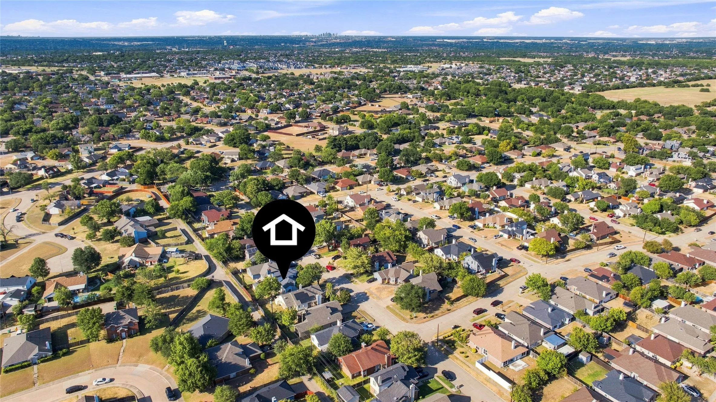 Aerial view showcasing the surrounding neighborhood and community setting.