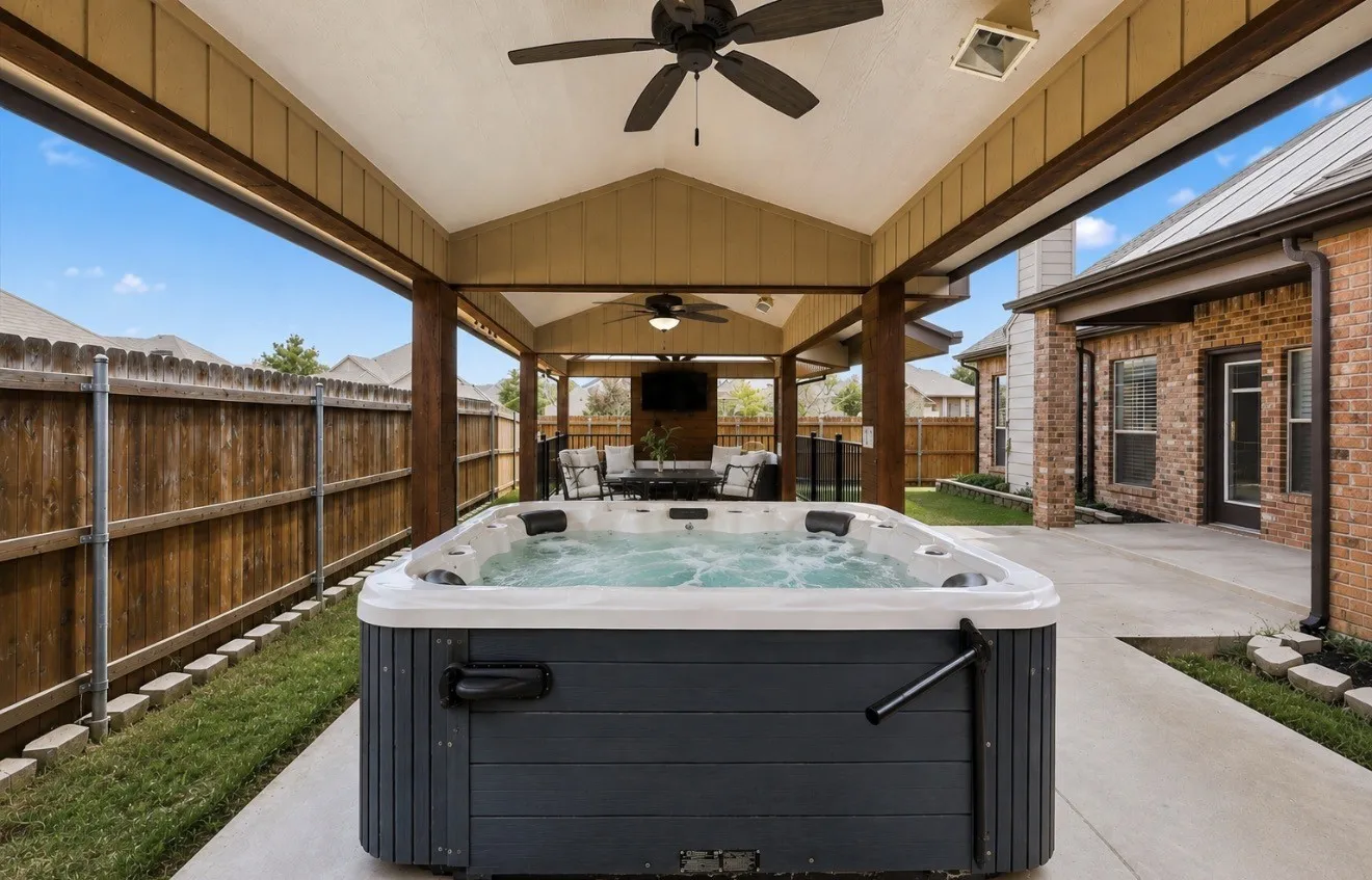 Outdoor Covered Patio Virtually Staged with Hottub uncovered with water