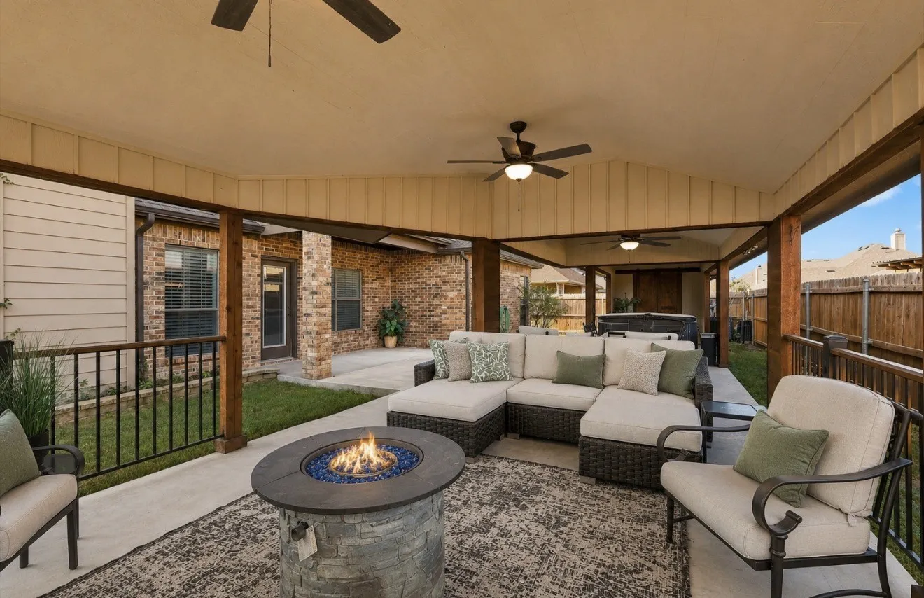 Outdoor Covered Patio Virtually Staged with Fire and Pillows