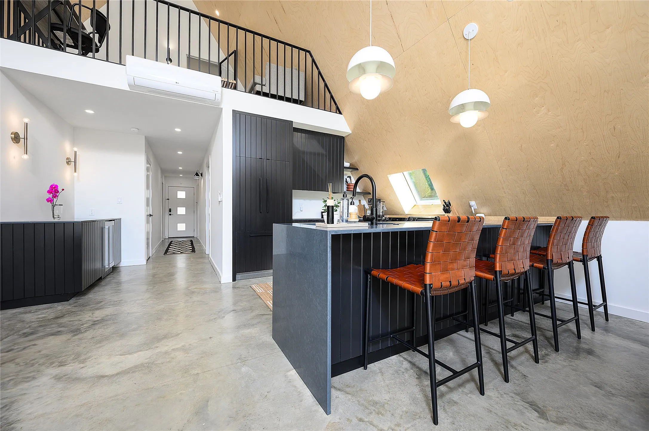 Built-in bar, waterfall counter top, plenty of storage, wine fridge