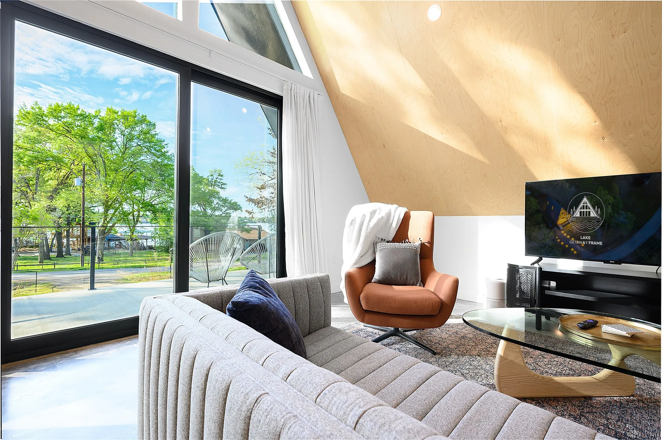 Windows from floor to ceiling let natural light in the open floor.