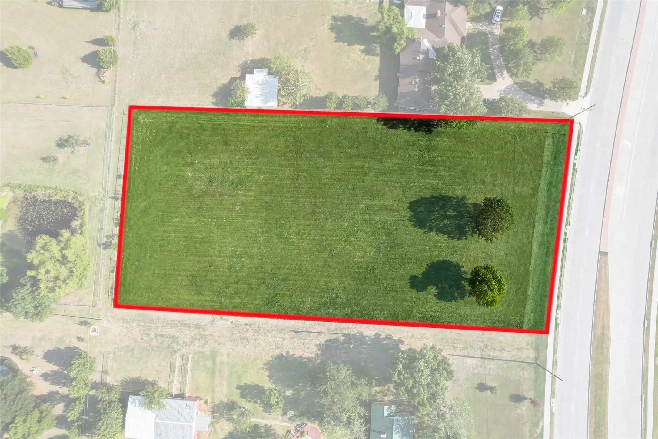Aerial image from 2023; boundary lines are approximate