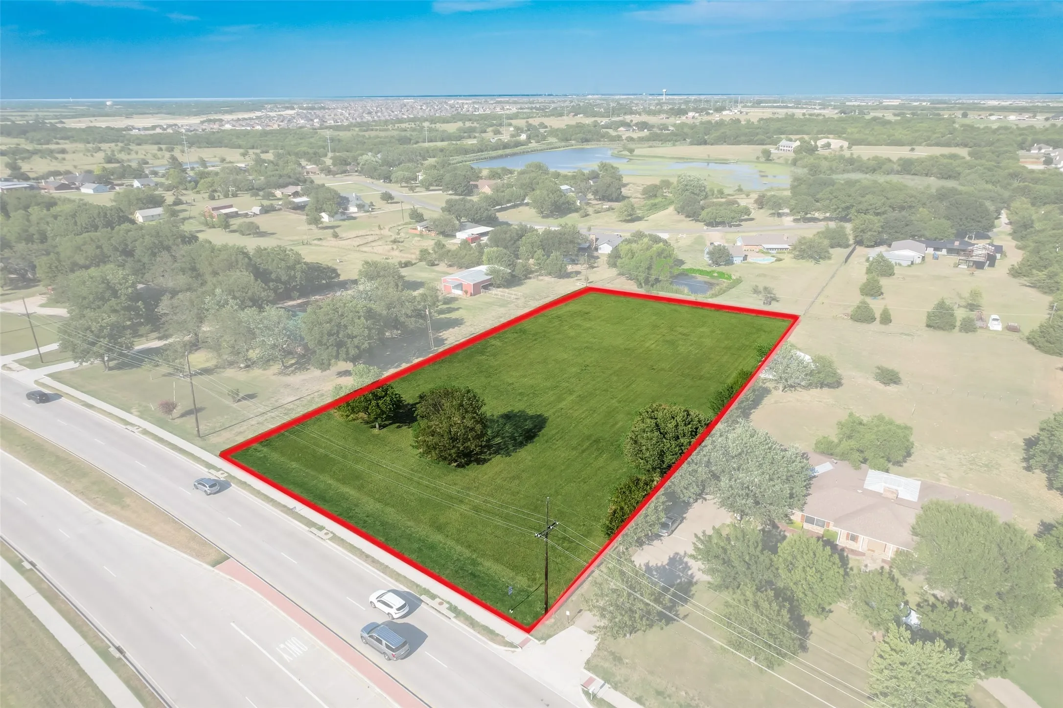 Aerial image from 2023; boundary lines are approximate