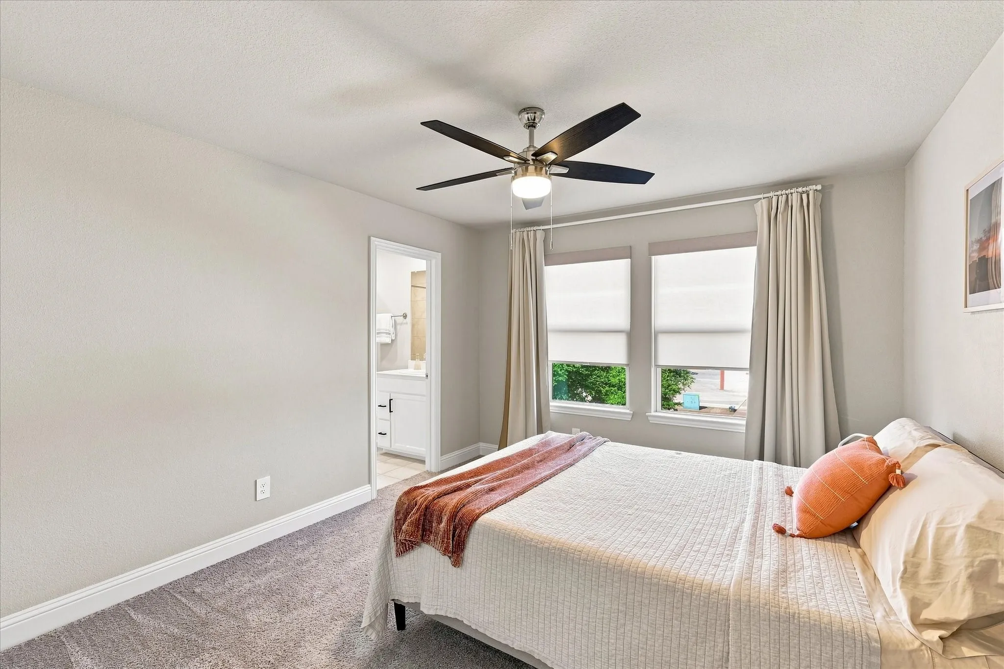 Carpeted flooring, recessed lighting, and a ceiling fan with integrated lighting