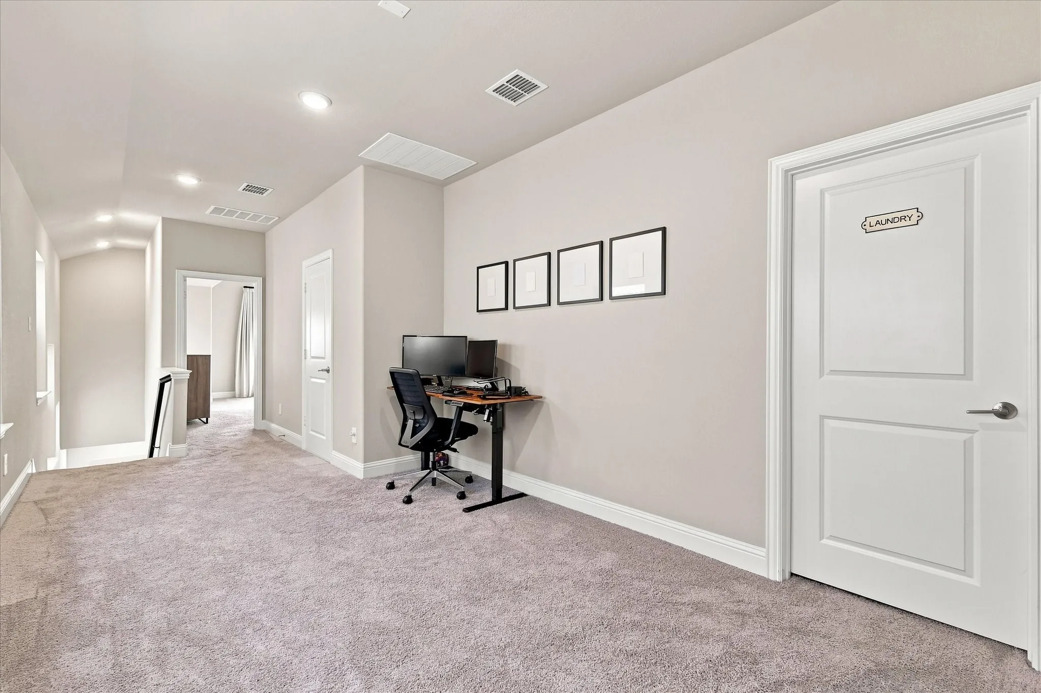 Loft area perfect for additional office space or an exercise room