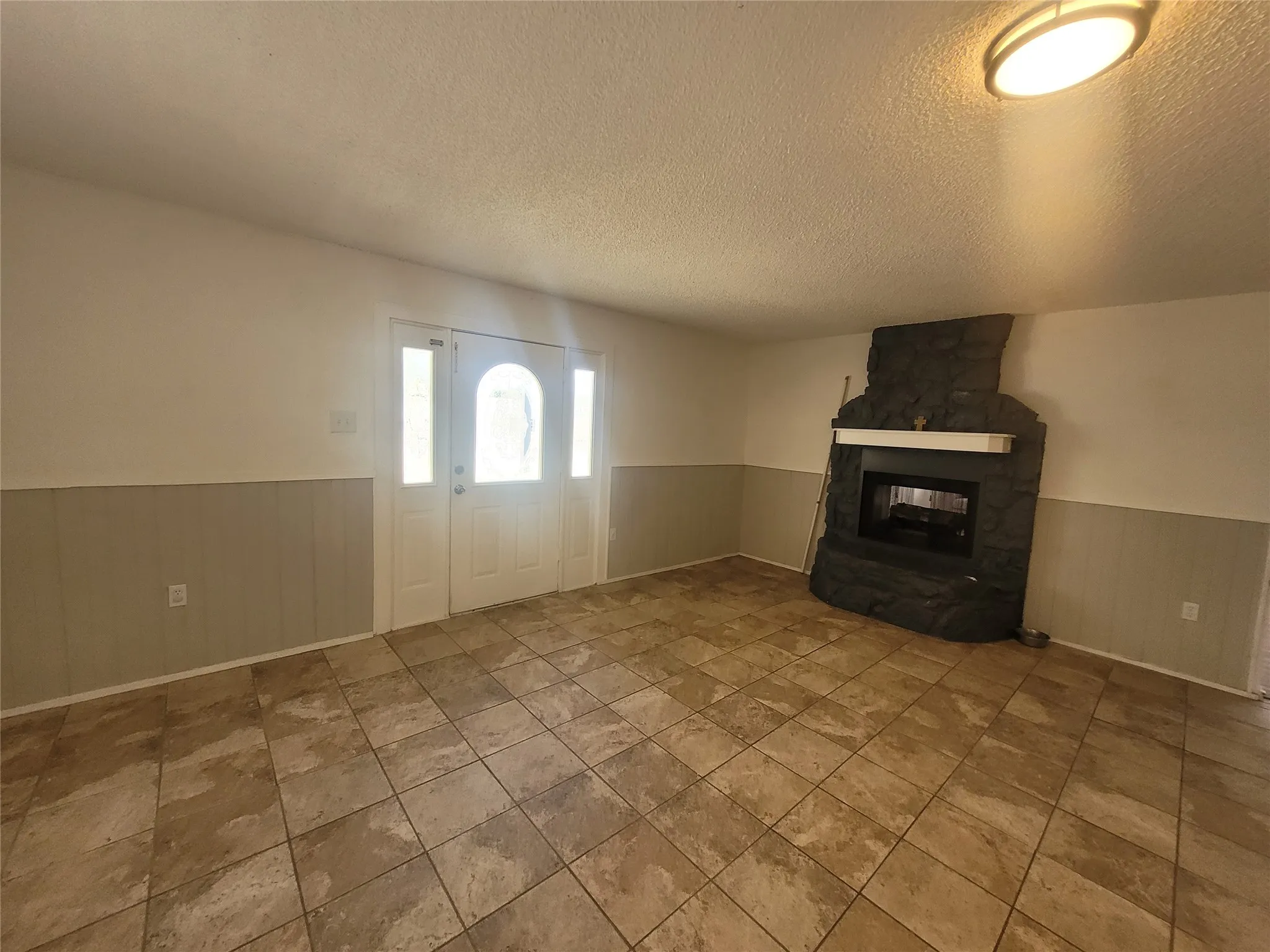 Tile flooring in open family area.