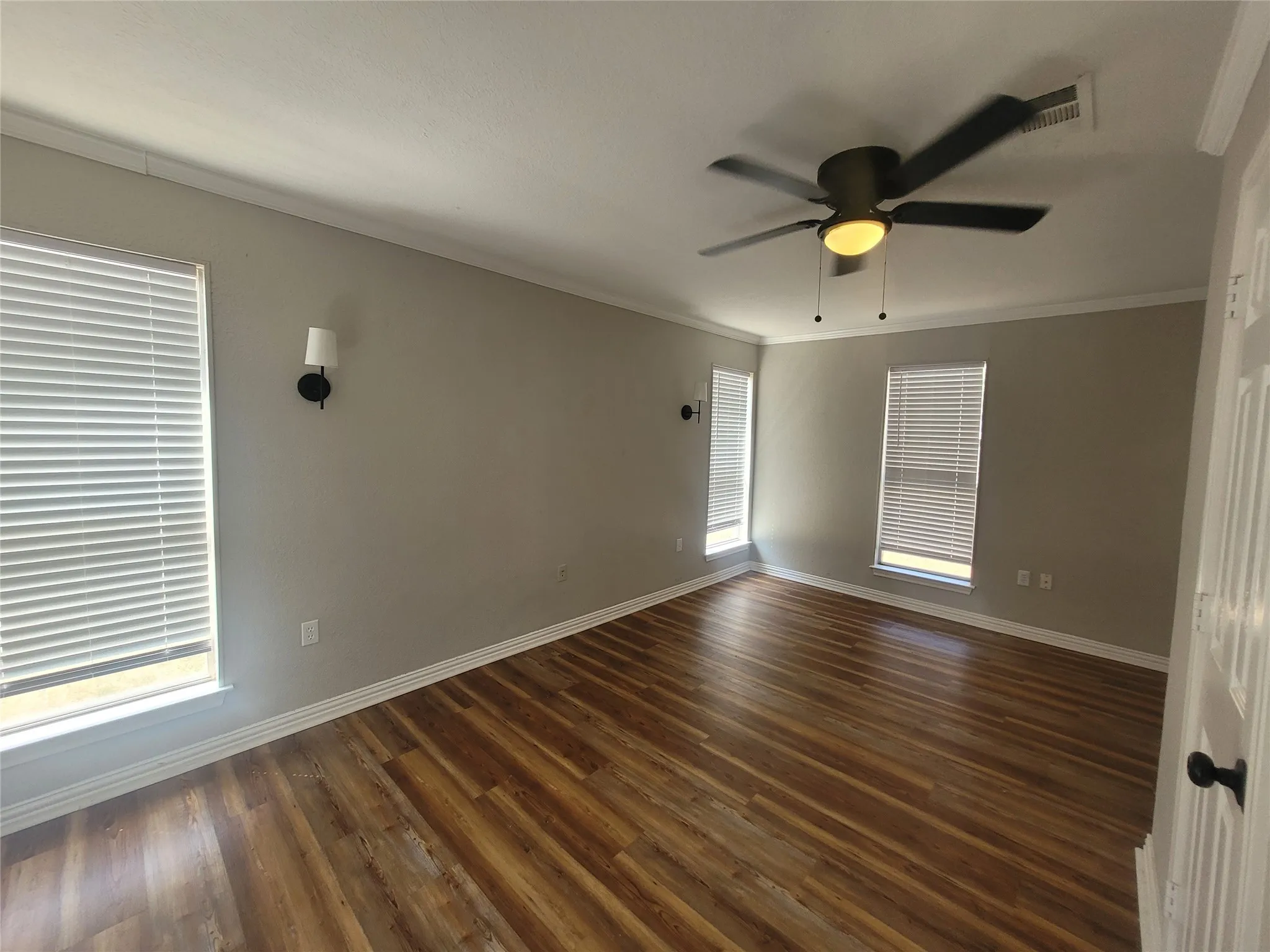 Primary bedroom with walk in closet and en suite bath.