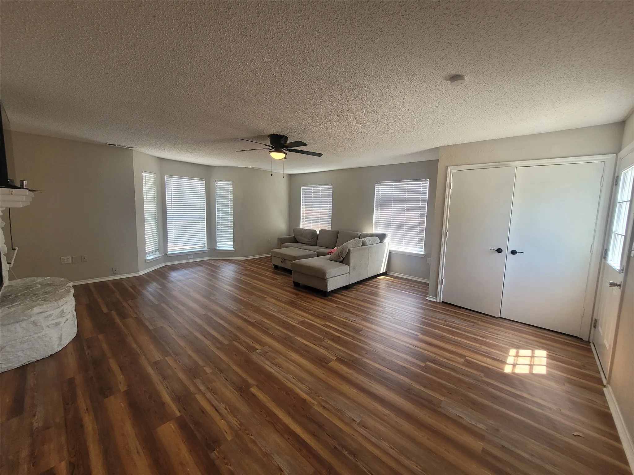 Beautiful wood flooring and nice bay window.