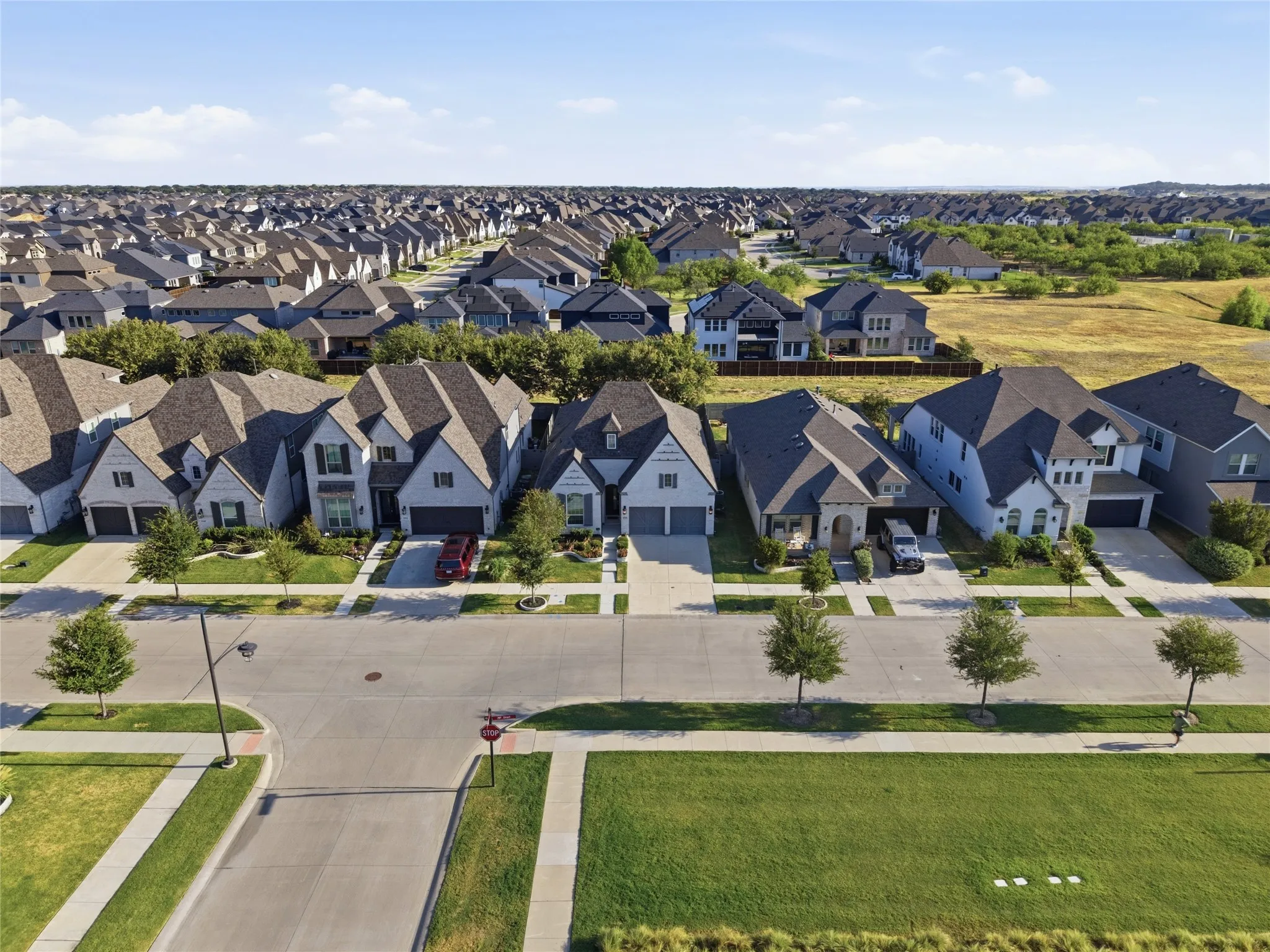 Home is conveniently located a short walk from the dog park and across from green space.