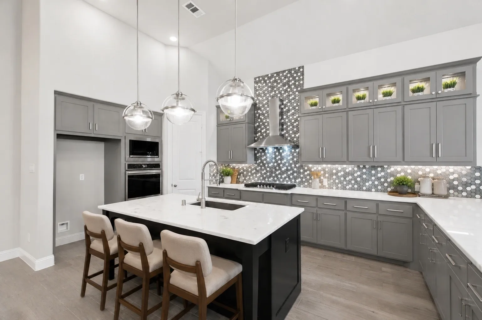 Oversized chef's kitchen complete with a double oven!