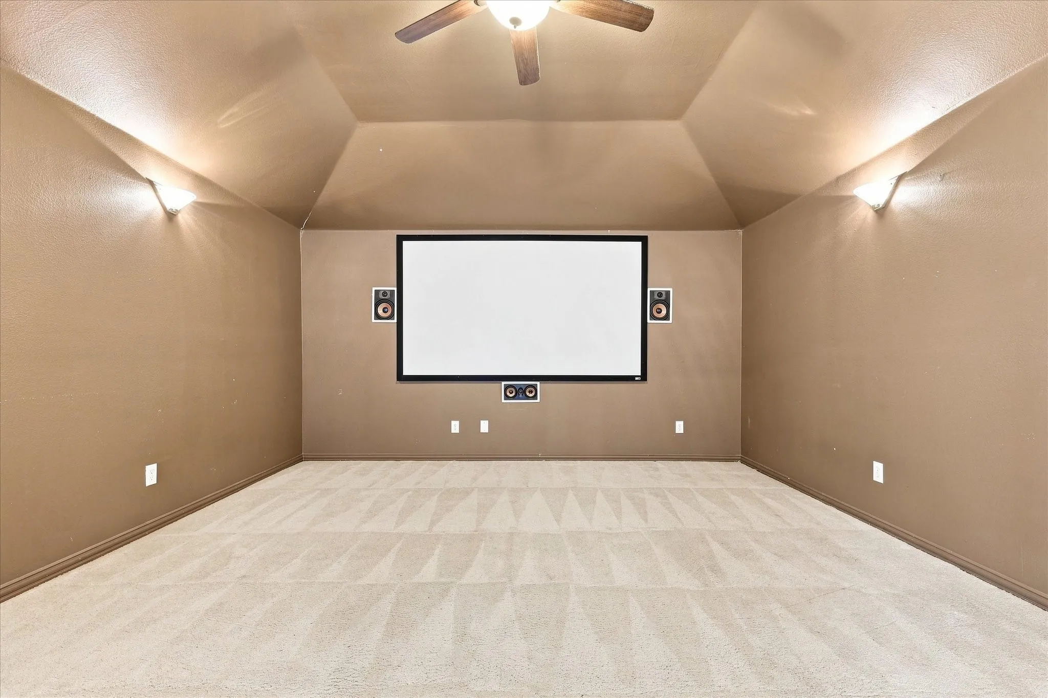 Media room with projector, screen and sound system