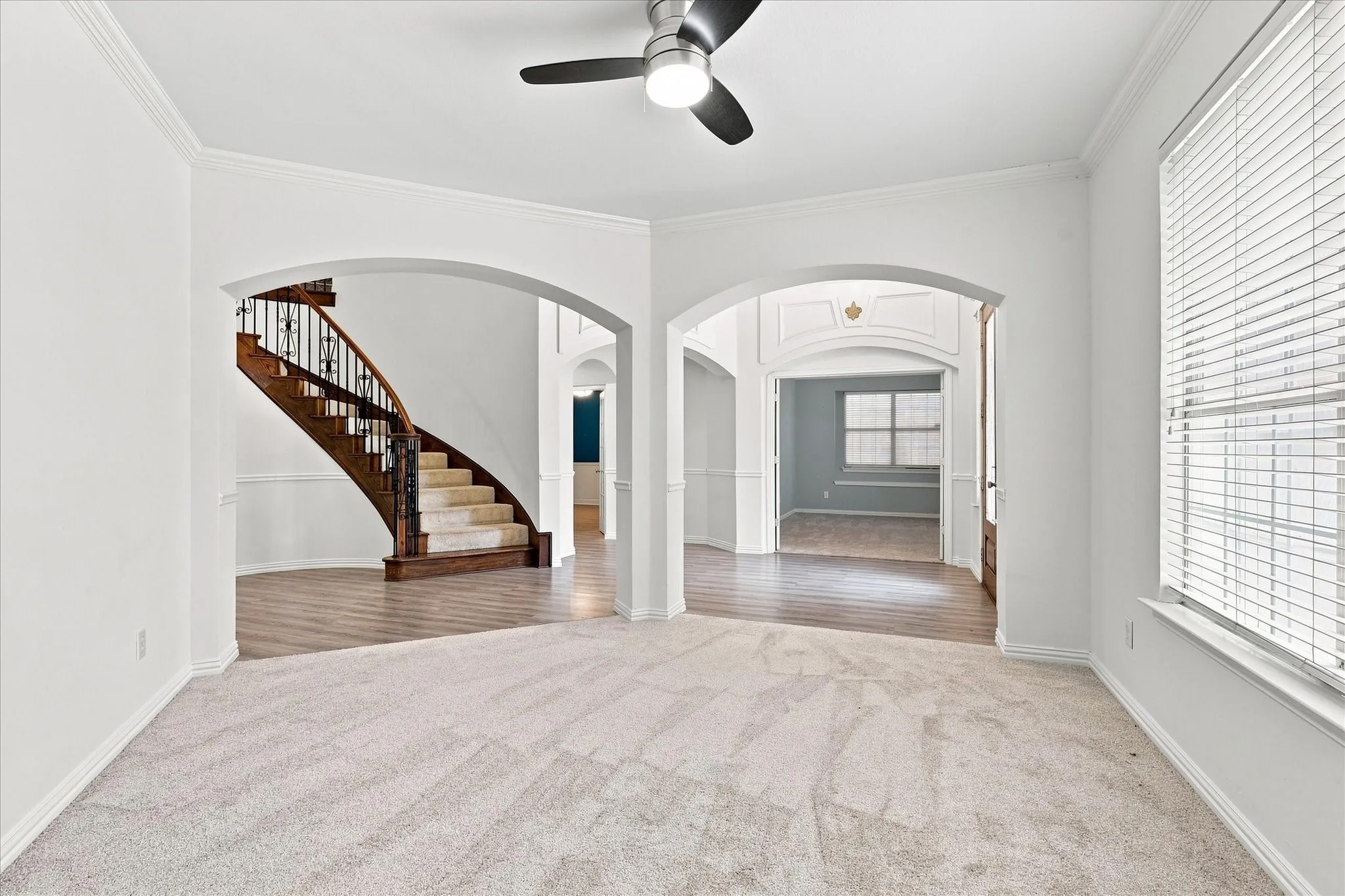 All the common areas have been freshly painted and all downstairs carpet is new