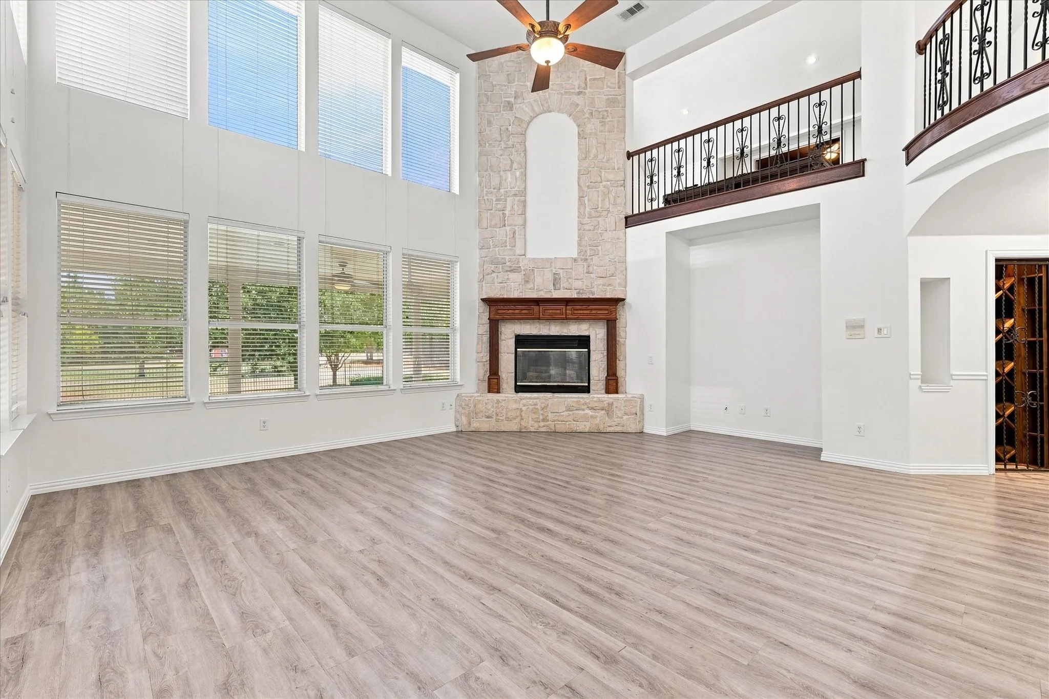 Gas fireplace with brickwork all the way to the ceiling.