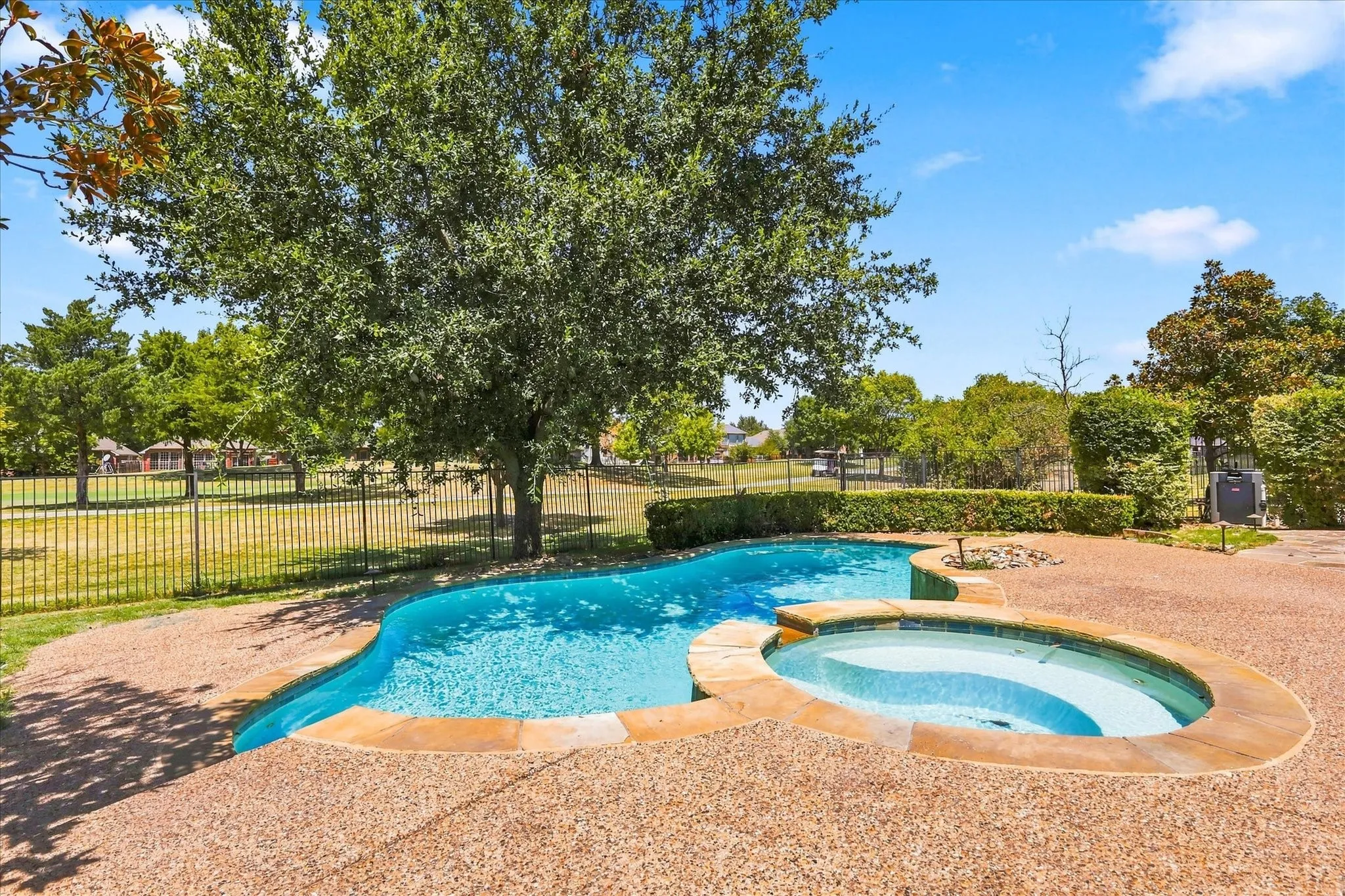 Watch the golf carts cruise by on the 18th hole while you relax in your hot tub