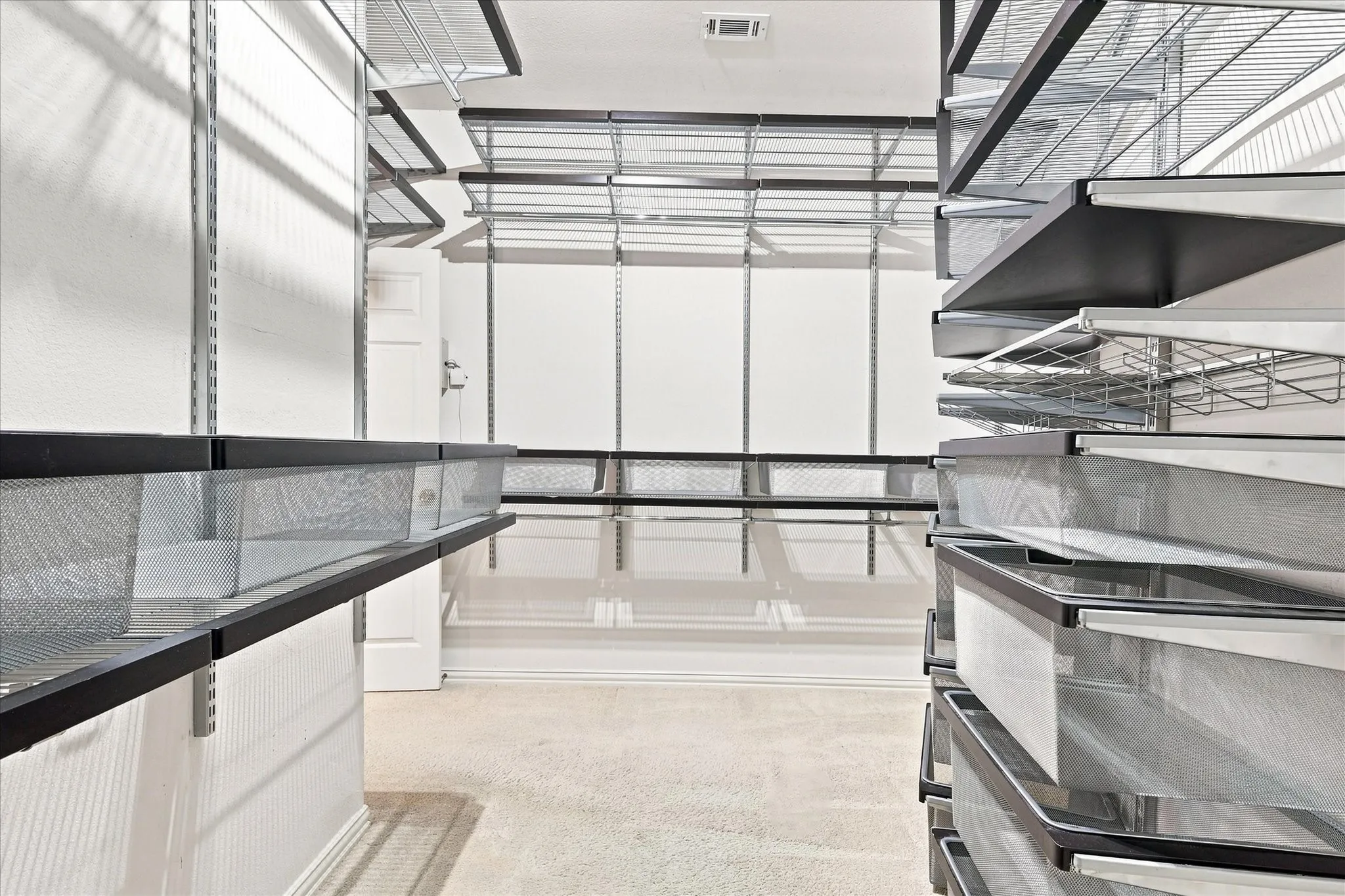 Custom closet organizer in the primary bedroom