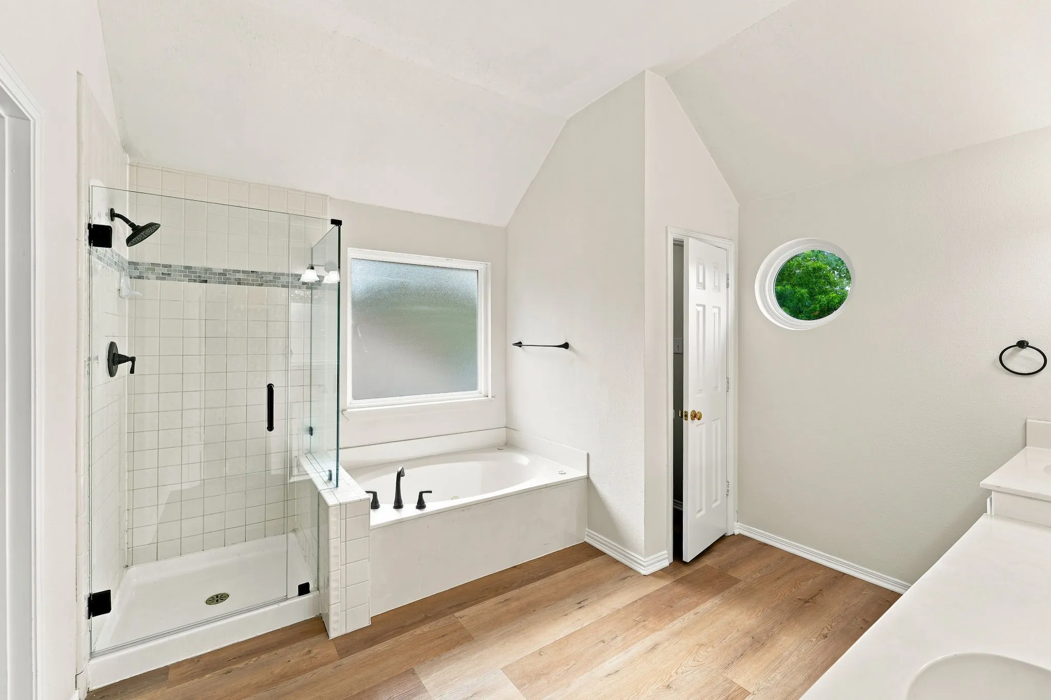 Separate tub, shower and water closet + new LVP.